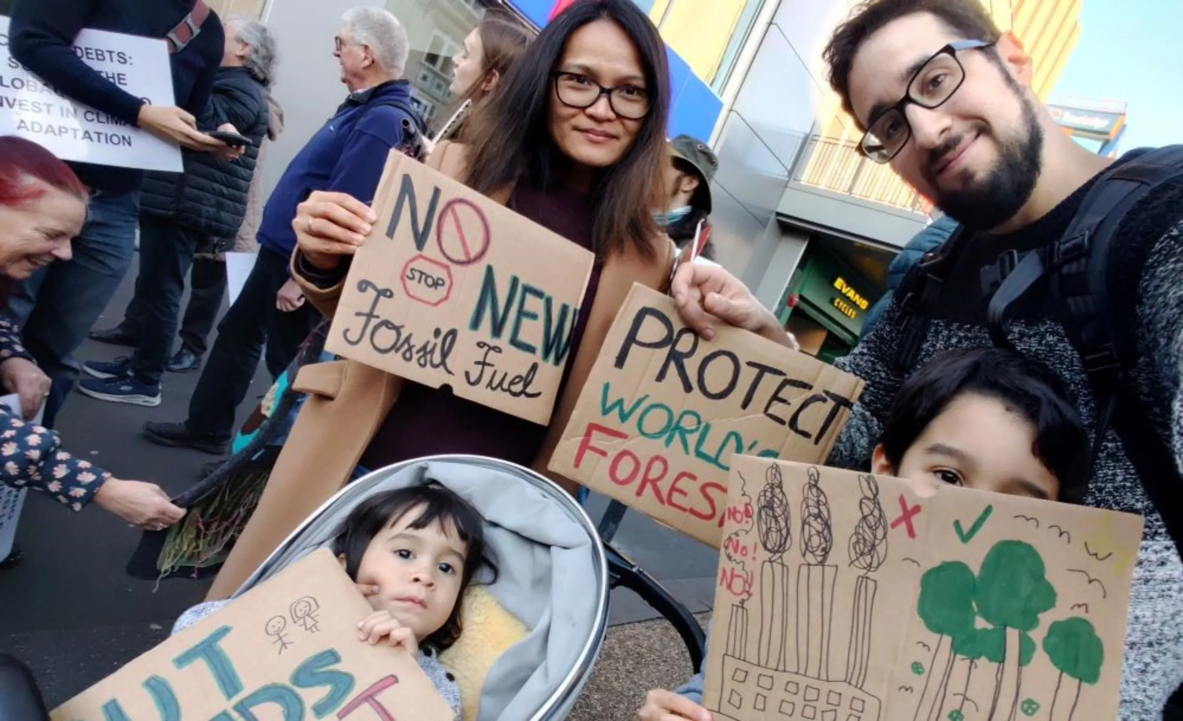 Jelly Mae Moring, her husband Pedro and their two children, aged 2 and 7, pose for a photo during a COP27 Climate Justice demonstration in Leicester, UK. November 12, 2022