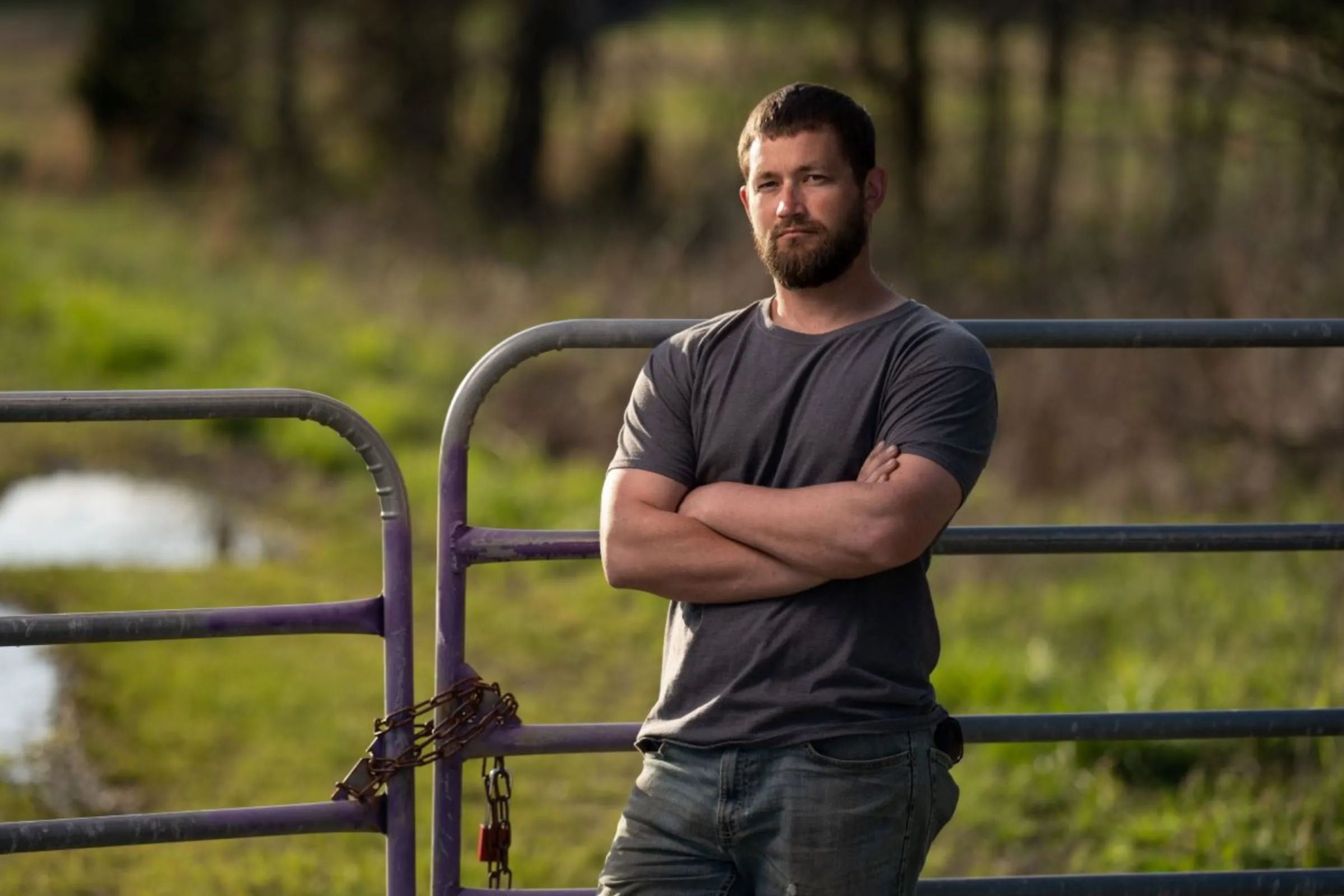 Hunter Hollingsworth stands on his property in Benton County, Tennessee in this undated photo. Institute for Justice/Handout via Thomson Reuters Foundation