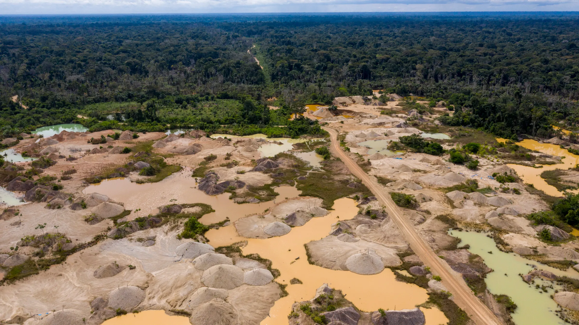 Gold mining near Delta 1, a  mining settlement in the Amazon rainforest of Madre de Dios, Peru, near the Amarakaeri Indigenous reserve. Madre de Dios, Peru. March 9, 2022. Alejandro Saldívar/Thomson Reuters Foundation