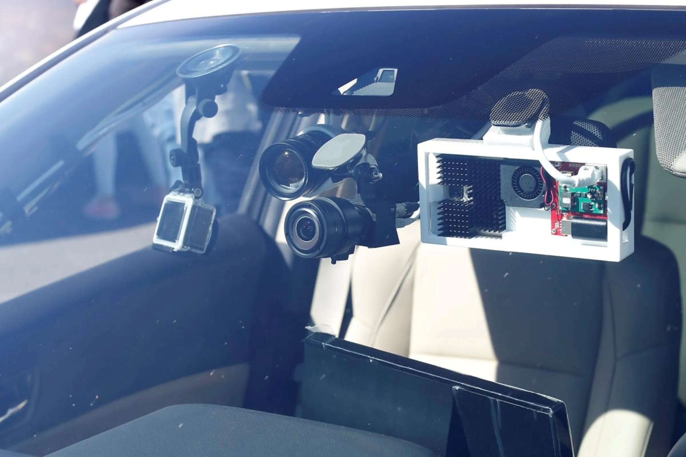 Sensors are seen mounted on the windshield of a self-driving car during a self-racing cars event in Willows, California, U.S., April 1, 2017. REUTERS/Stephen Lam