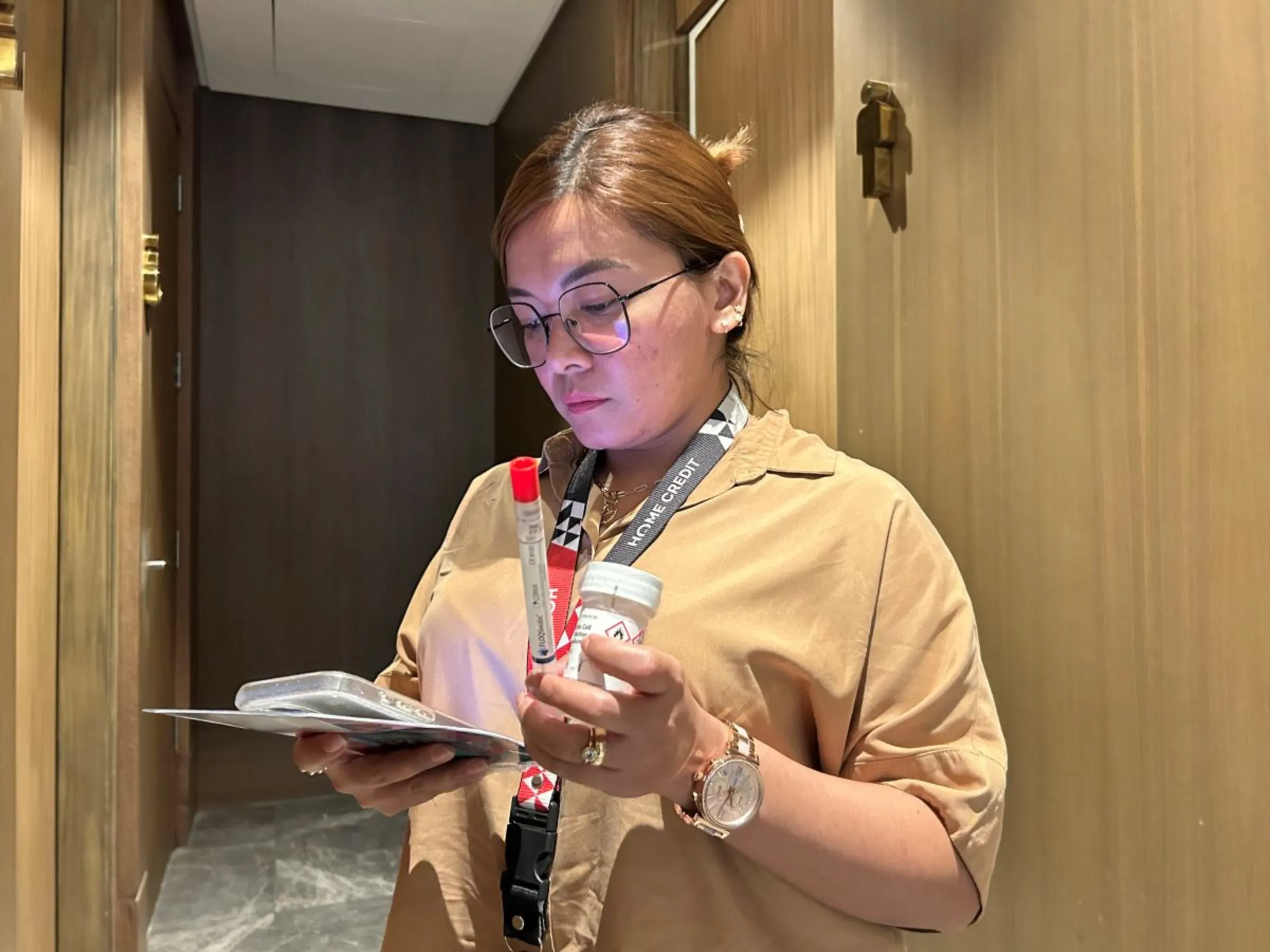 Office worker Gemma Remojo attends a free HPV test in her workplace in Taguig City, Philippines on Jan. 26. Mariejo Ramos/Thomson Reuters Foundation