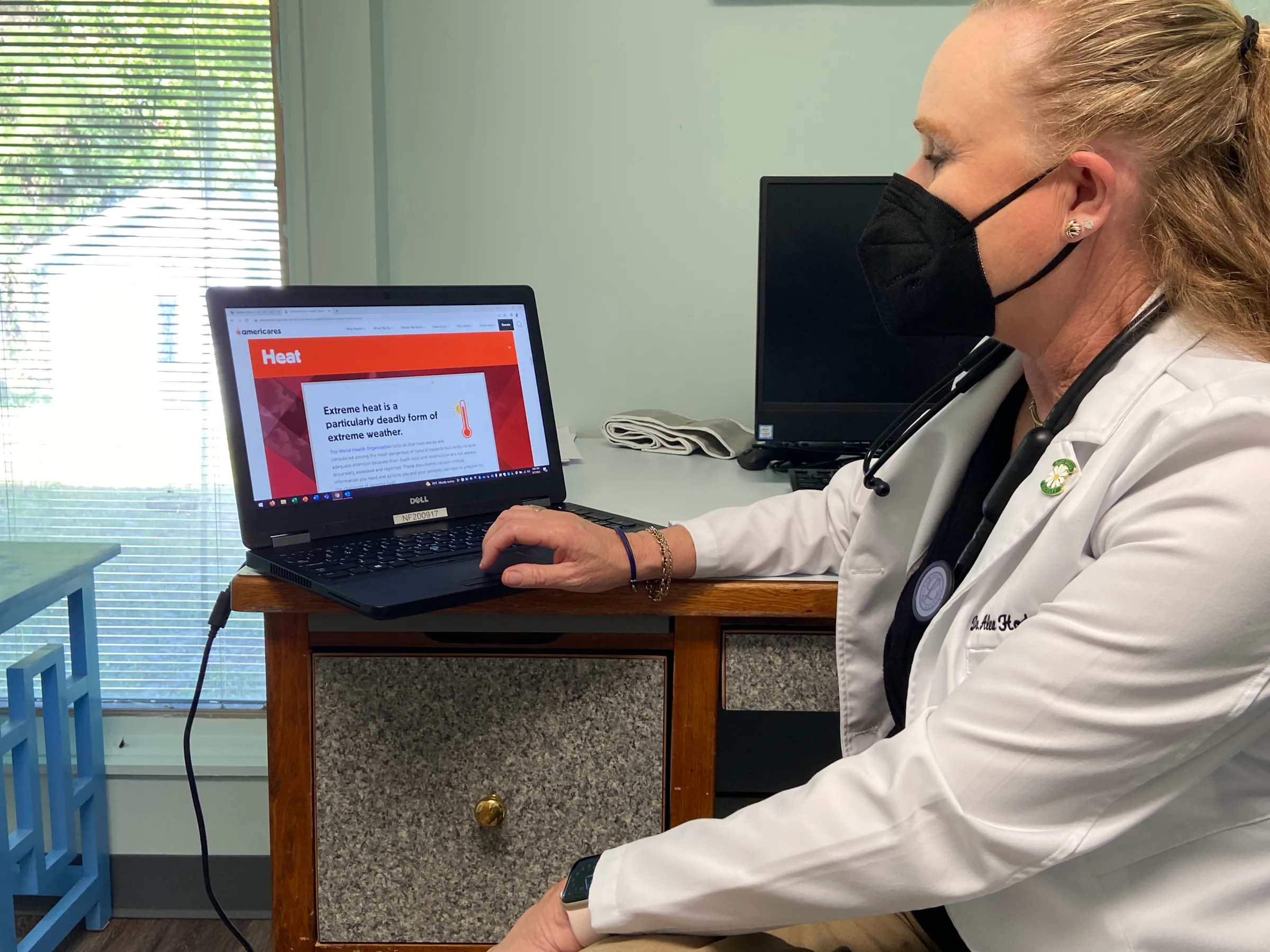 Nurse practitioner Alexis Hodges accesses a toolkit on extreme heat preparation in her office at the Community Care Clinic of Dare in Nags Head, North Carolina, USA, September 7, 2022. Thomson Reuters Foundation/David Sherfinski