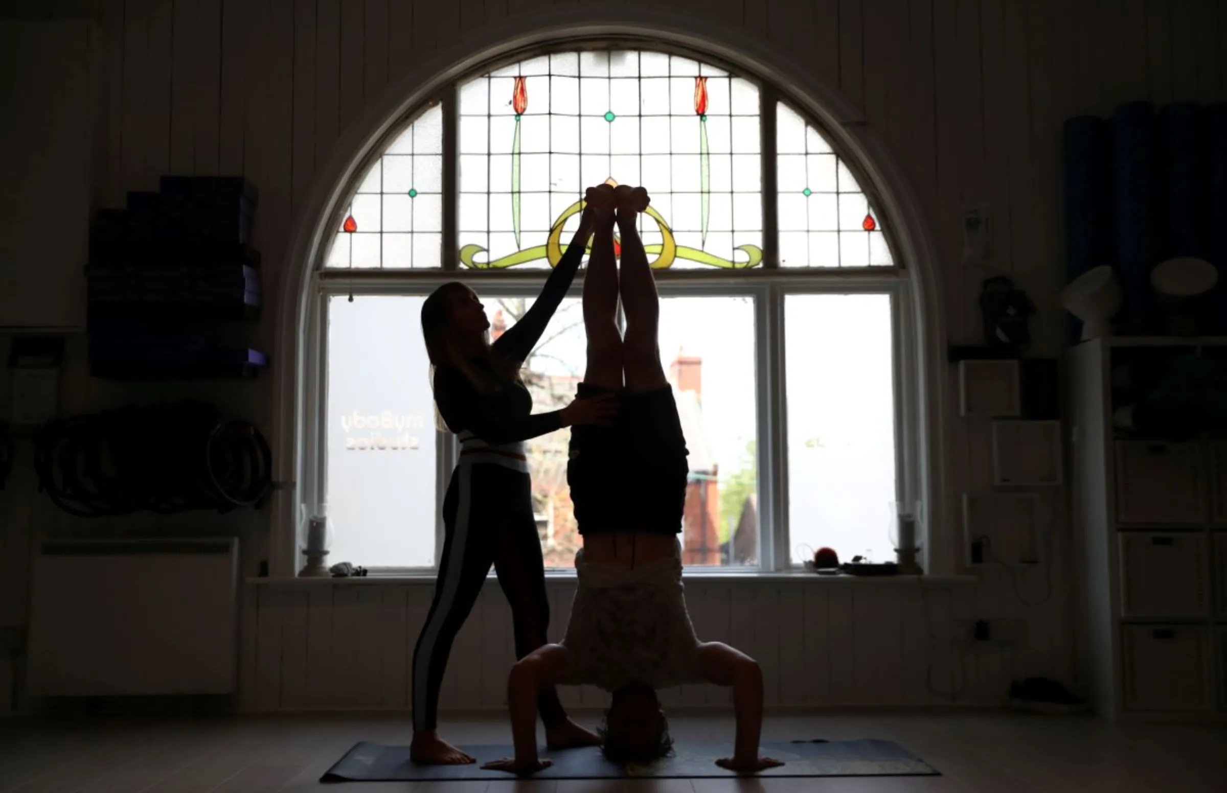 Yoga instructors are seen as they get ready for reopening of MyBody Studios, following the coronavirus disease (COVID-19) outbreak, in East Boldon, near Sunderland Britain July 24, 2020. REUTERS/Lee Smith