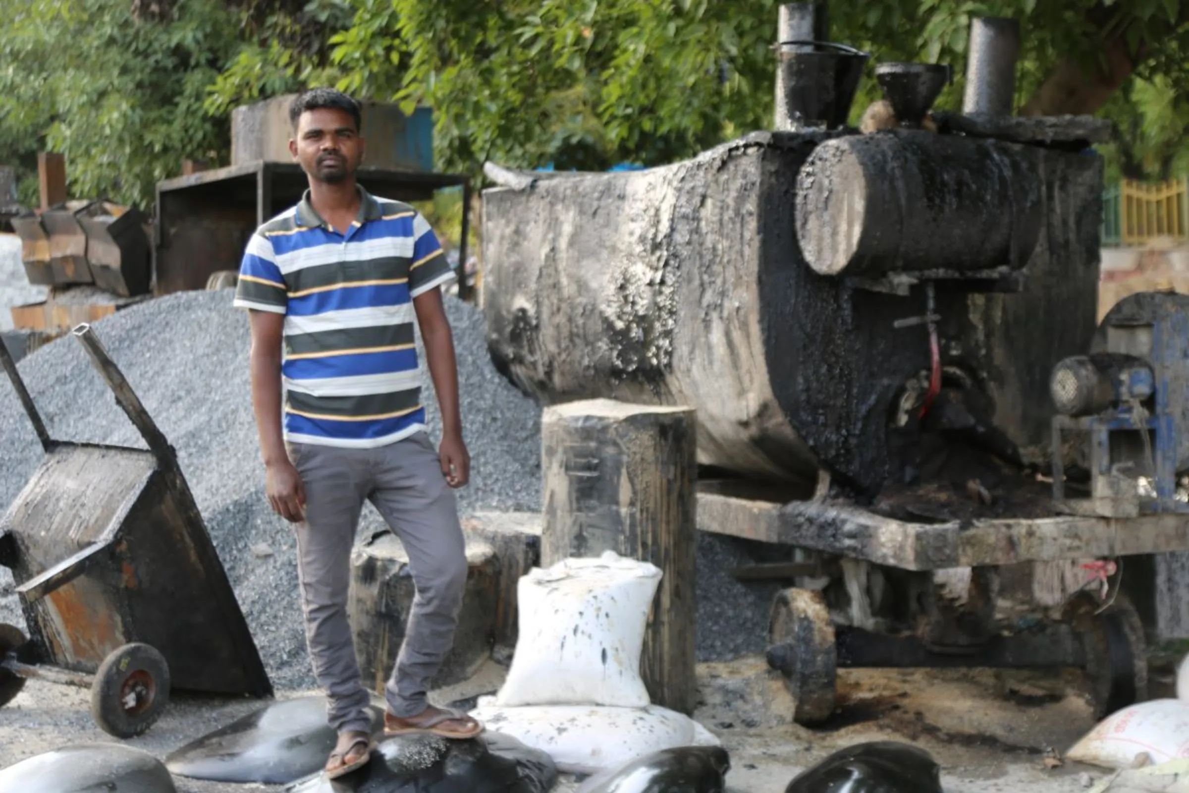 Pramod Kumar, a road building labourer, will not go back to his home state of Bihar to vote in May over fears of losing wages, Noida, India, April 24, 2024. Thomson Reuters Foundation/Annie Banerji