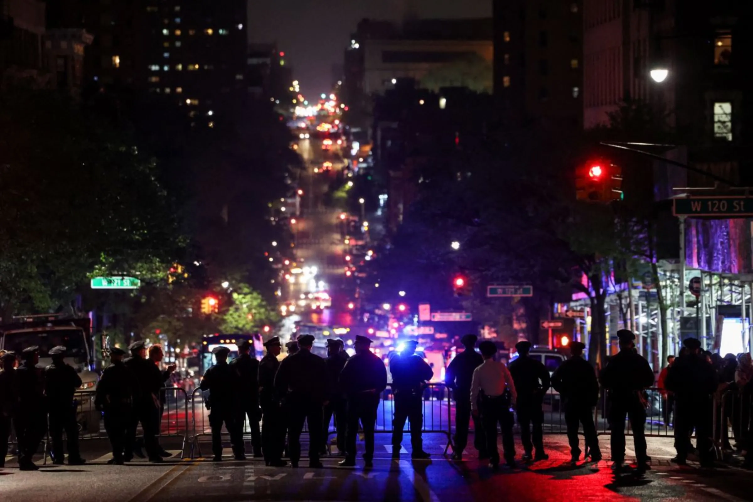 NYPD law enforcement officials hold a perimeter of closed streets surrounding Columbia University in New York City, U.S., April 30, 2024. REUTERS/Caitlin Ochs