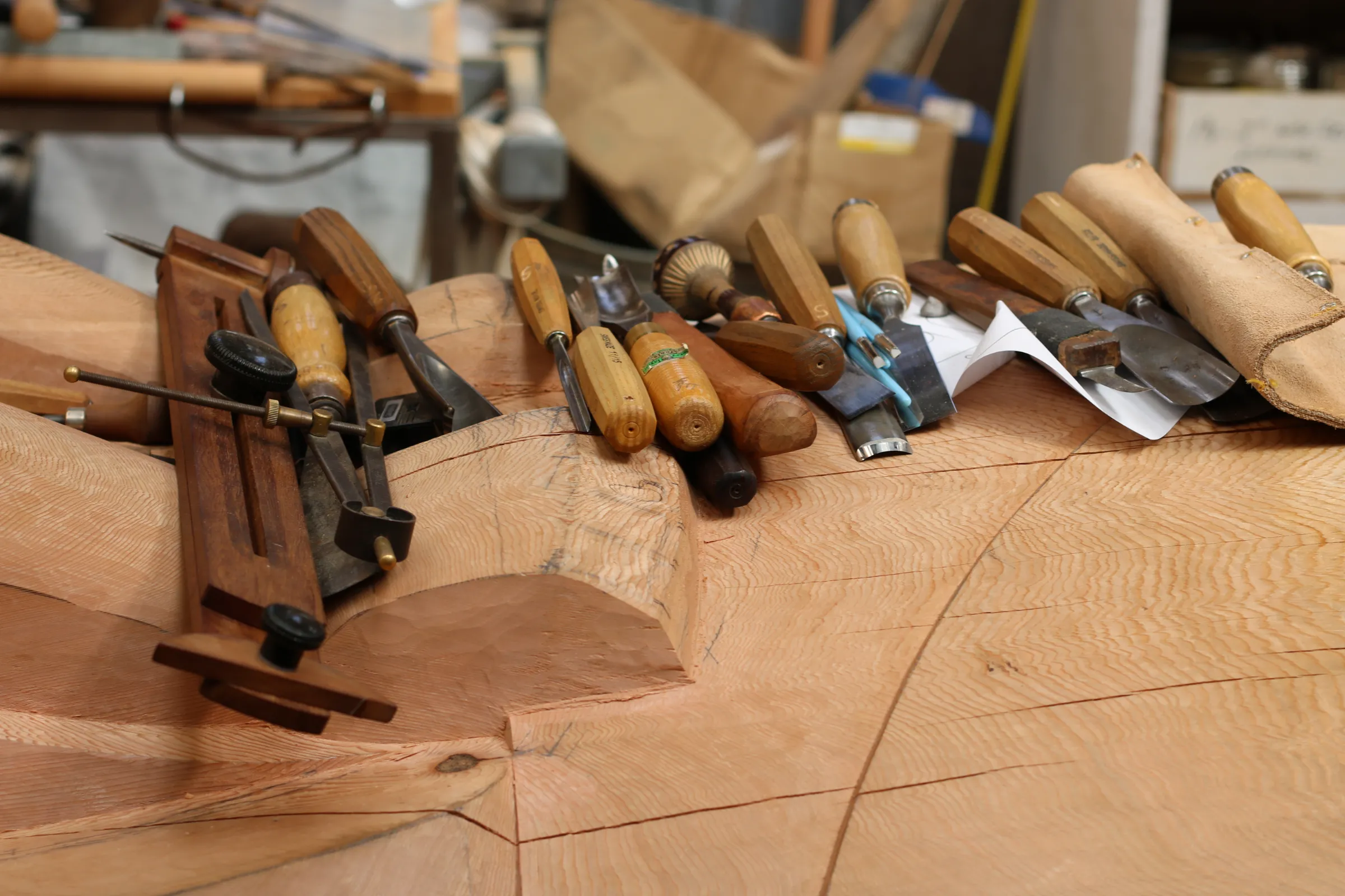 Haida Gwaii carver Gwaai Edenshaw says cedar responds predictably to tools, and its natural oils protect it from insects and fungi, on Graham Island, Canada. July 23, 2024. Thomson Reuters Foundation/Jack Graham