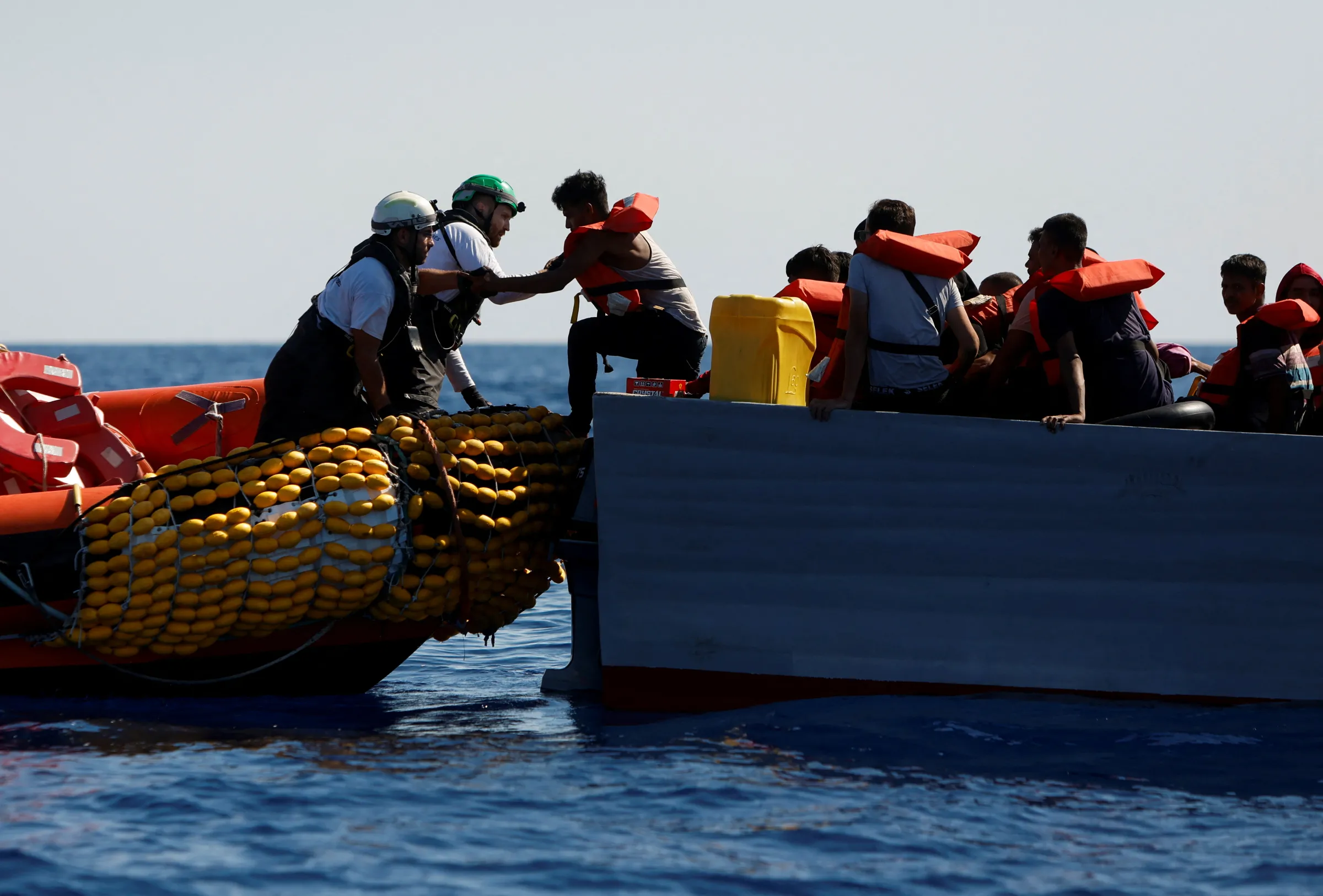 Migrants are rescued by rescue ship, operated by Medecins Sans Frontieres (Doctors Without Borders), in international waters off the coast of Tunisia in the central Mediterranean Sea July 19, 2024. REUTERS/Darrin Zammit Lupi