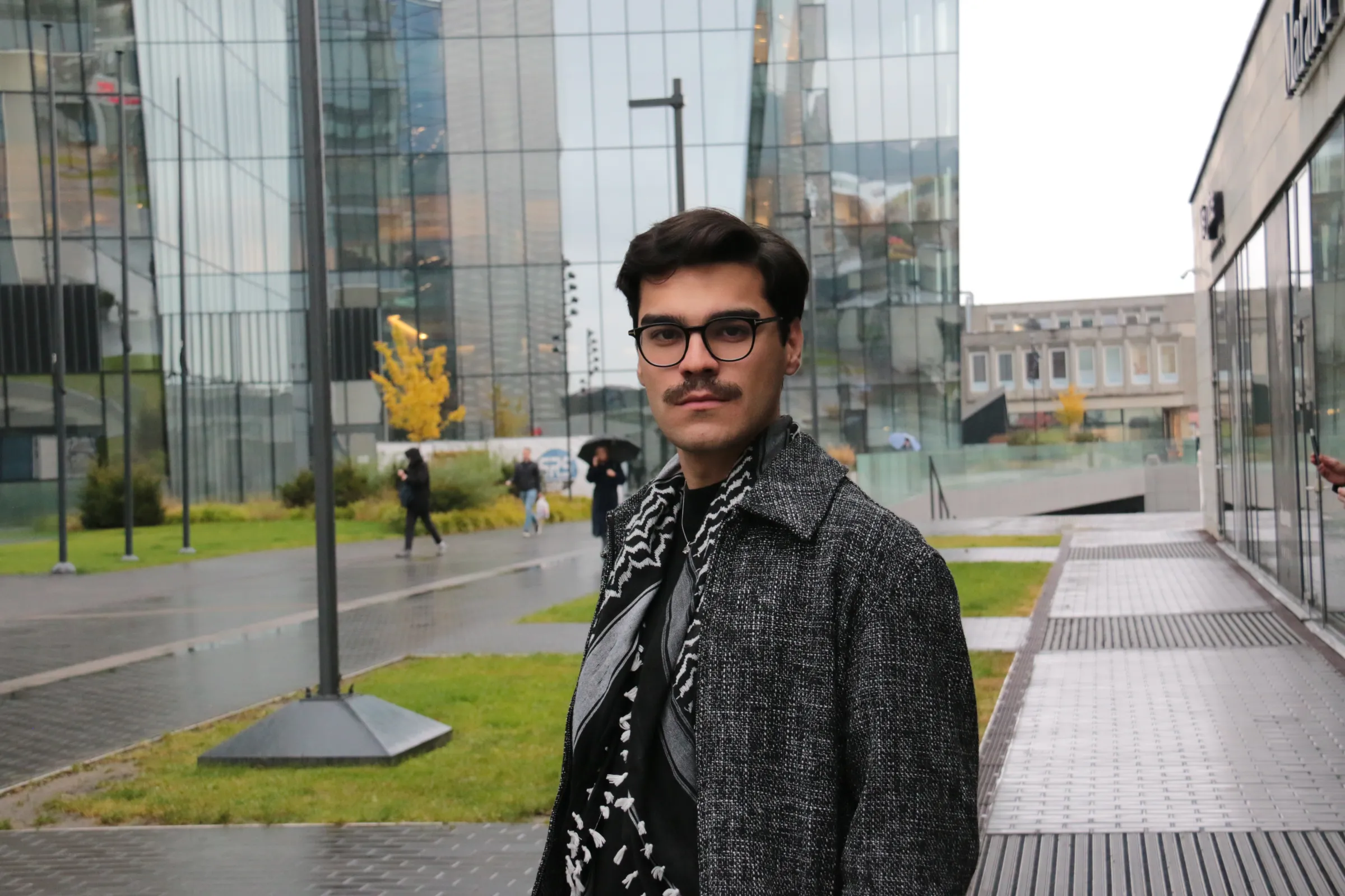 Turkish activist Enes Hocaoğulları poses for a photo following his release from detention on the sidelines of the ILGA Europe conference in Vilnius, Lithuania, on October 23, 2025. Thomson Reuters Foundation/Lucy Middleton