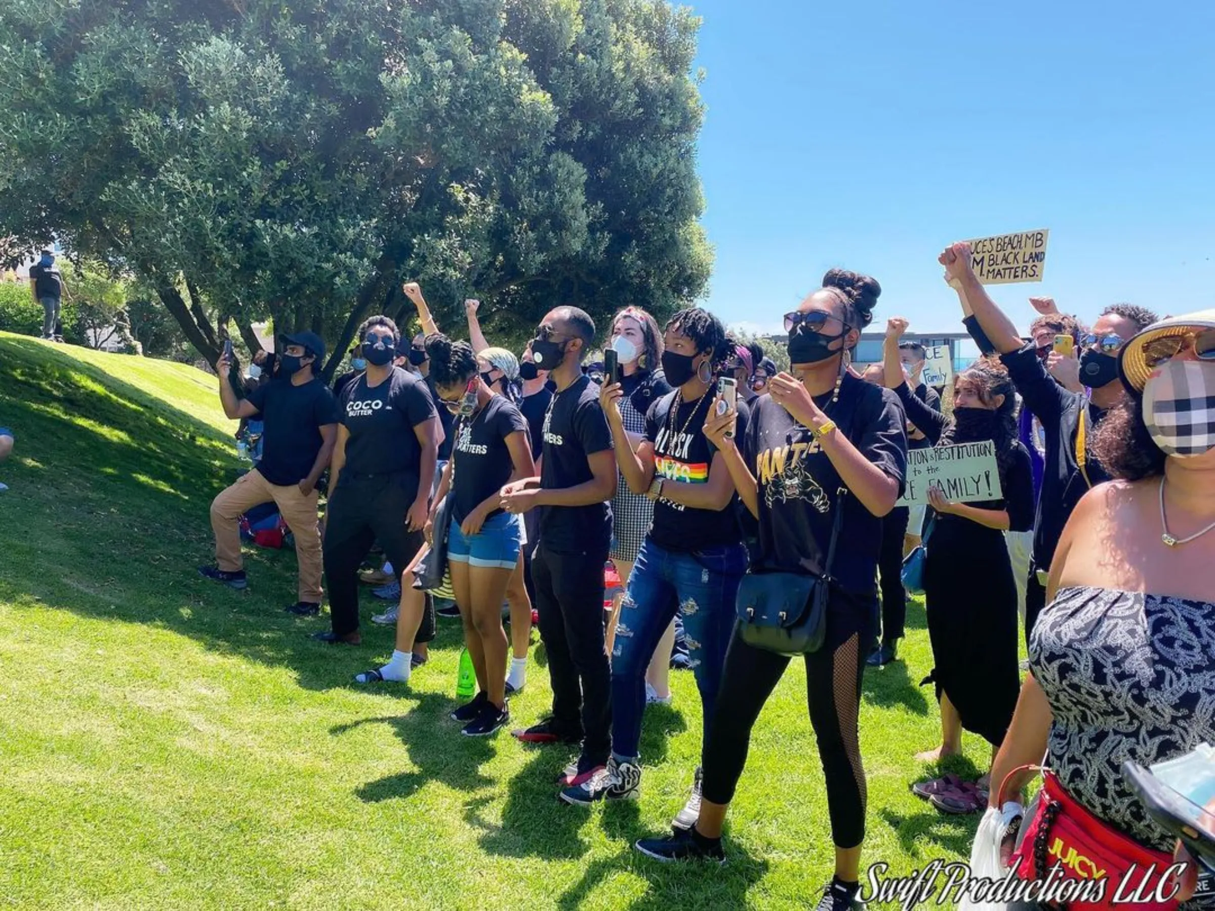 Demonstrators call for the return of Bruce’s Beach to the Bruce family in October 2020 in Manhattan Beach, California.