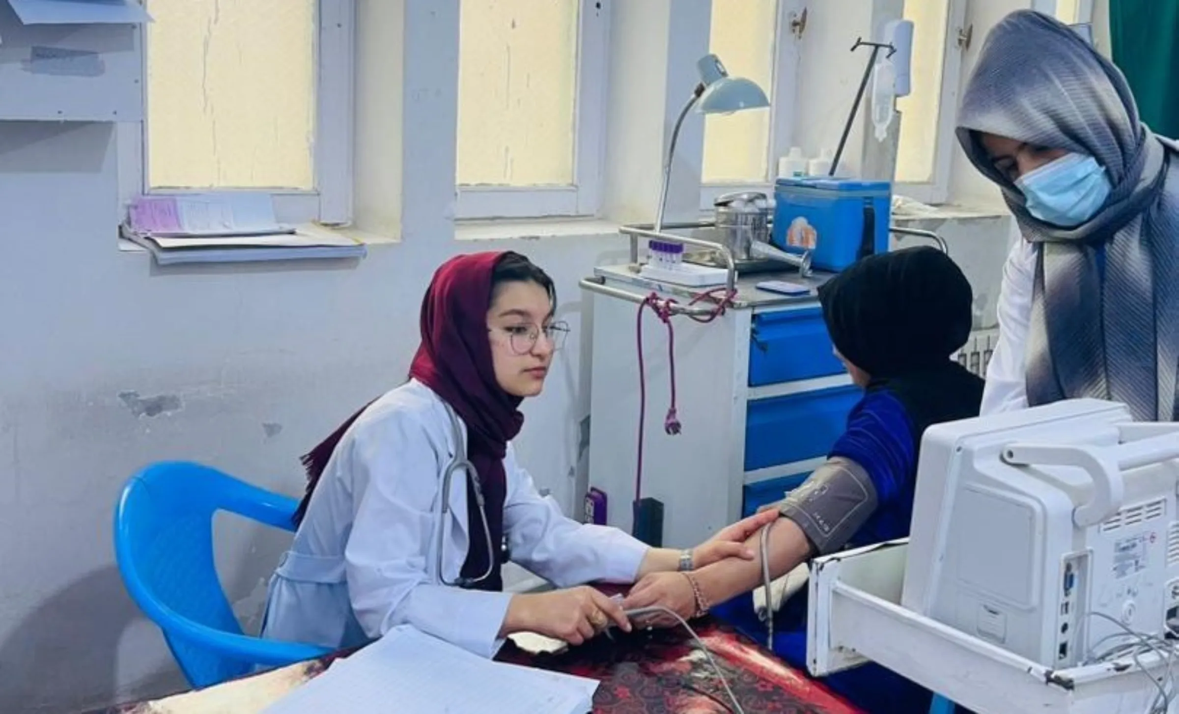 Student nurse Marwa Azimi attends to a patient during a clinical placement in Badakhshan province. Handout via Thomson Reuters Foundation