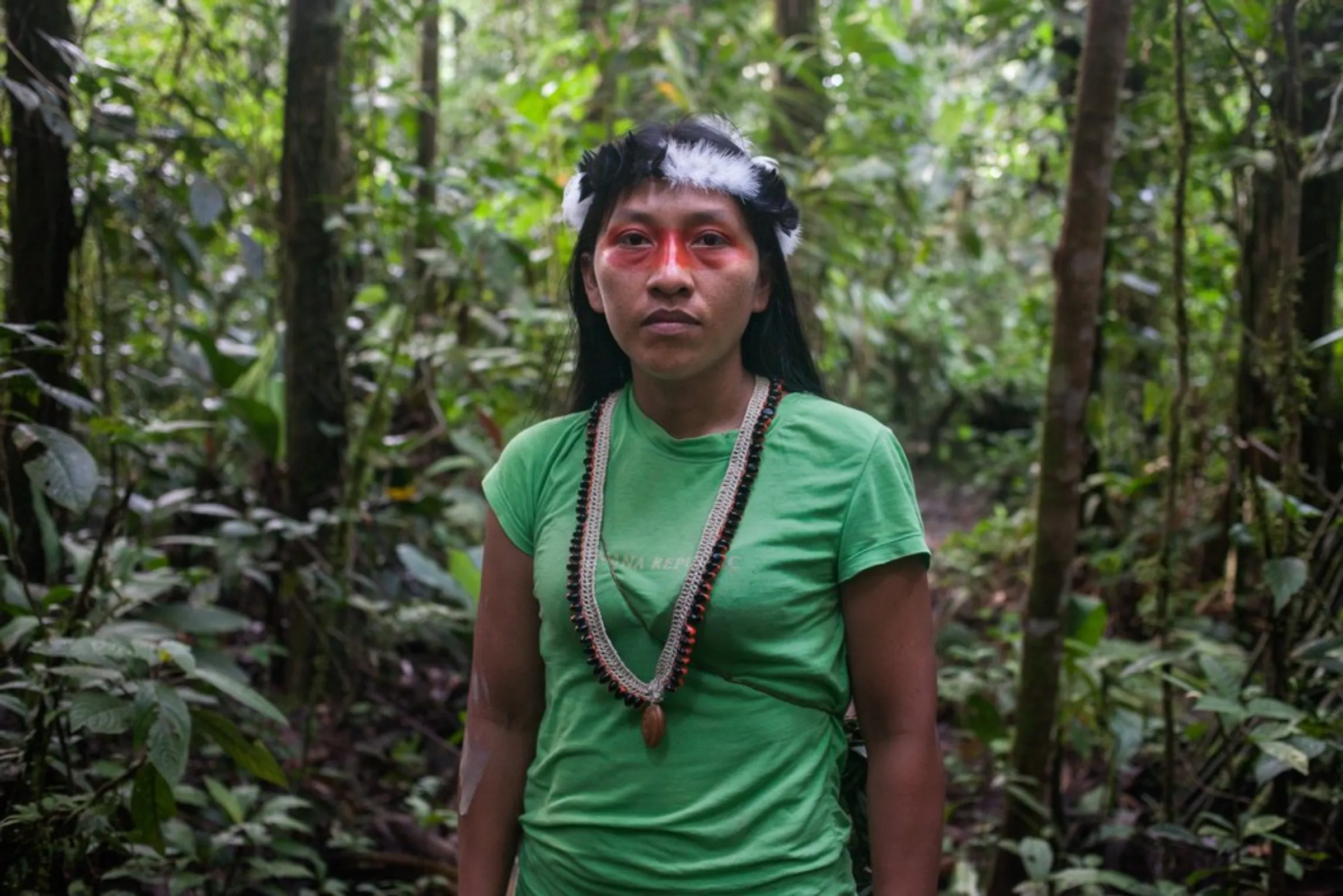 Silvana Nihua, president of the Waorani Organization of Pastaza (OWAP) and leader of 30 communities of about 1,000 Pastaza Waorani people living in riverside villages, stands in pristine Amazon rainforest in the province of Pastaza, Ecuador, on April 26, 2022
