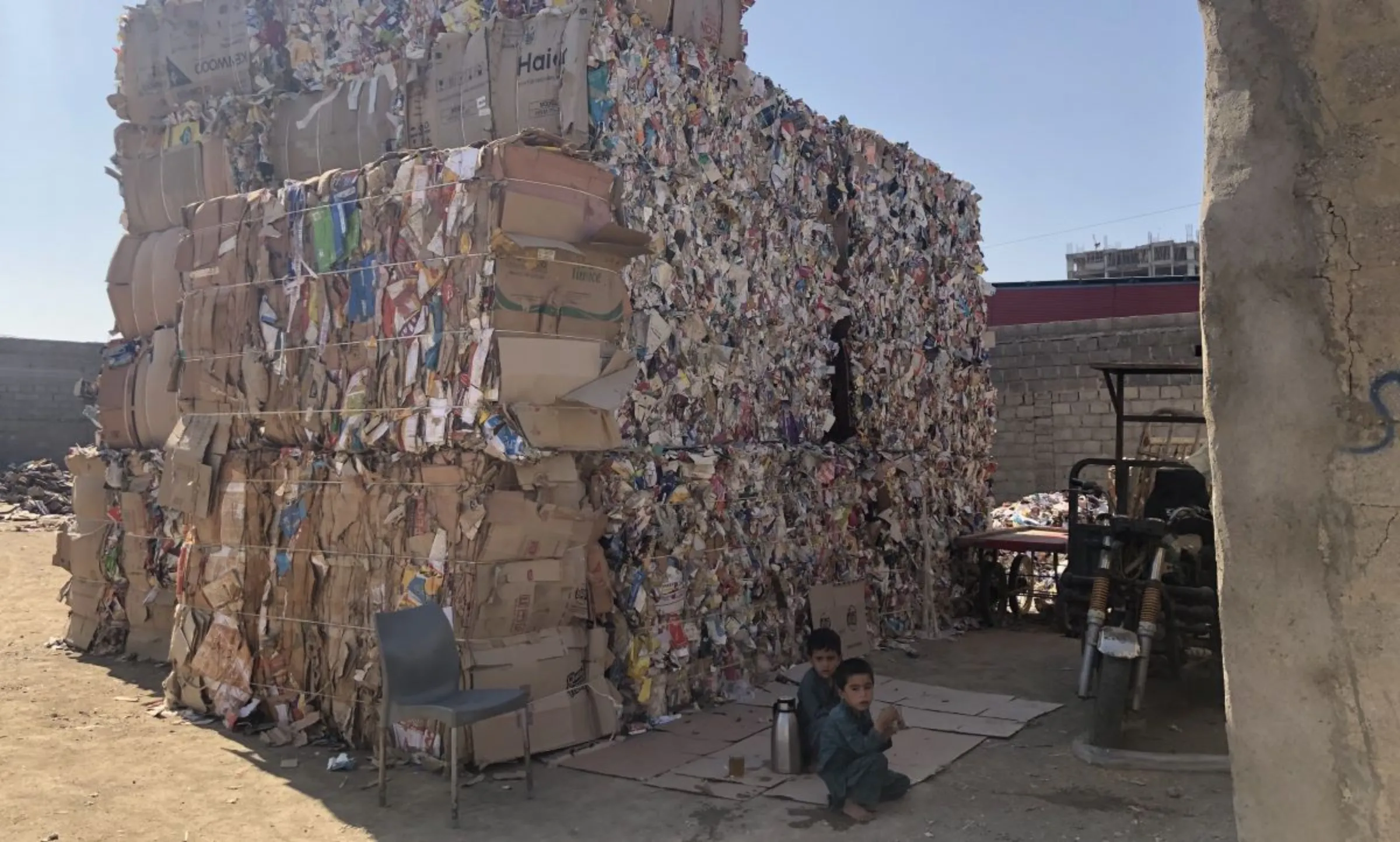 A cardboard dealer’s junkyard behind Al-Asif Square, in the Malir district of Karachi, Pakistan, November 11, 2023