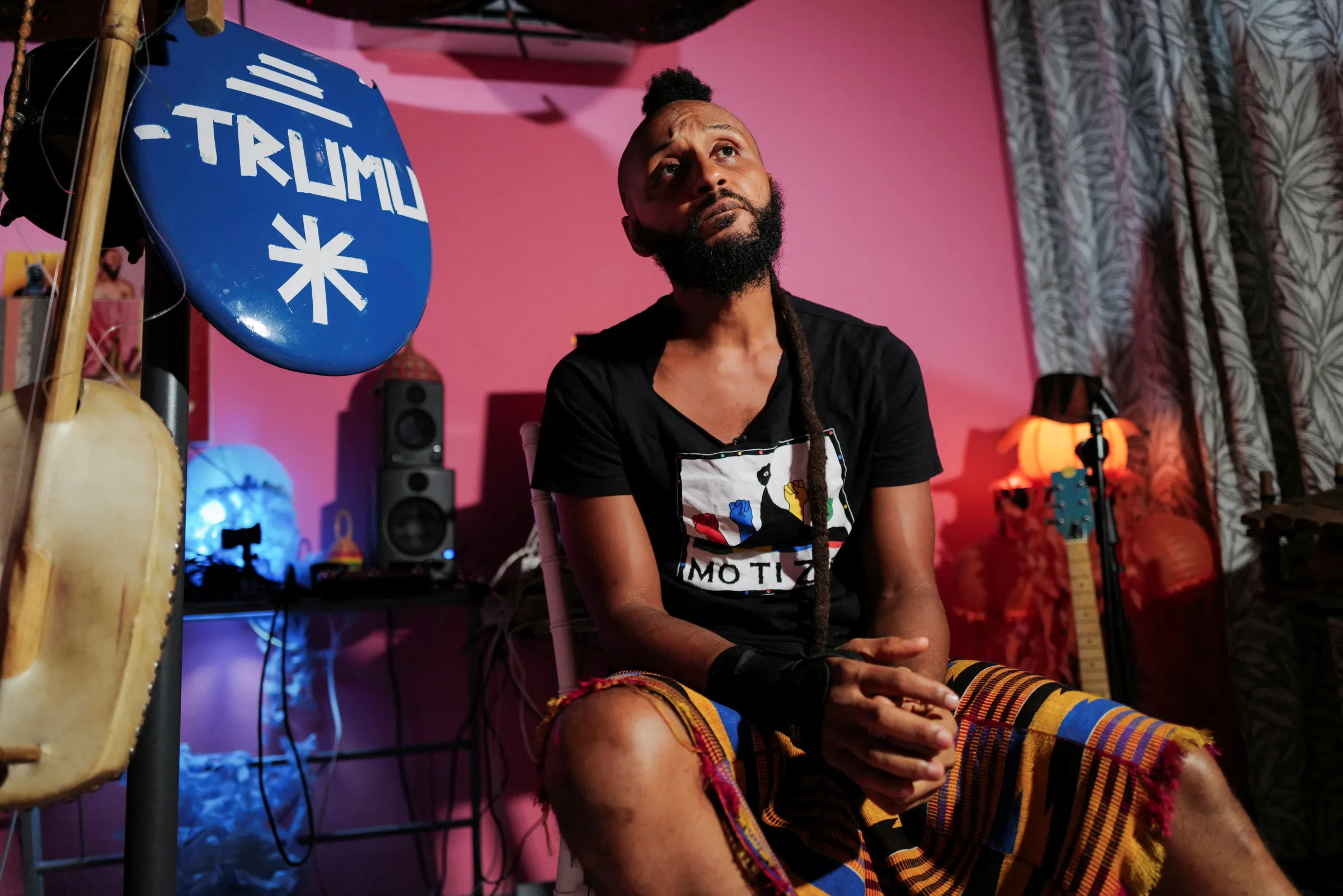 Wanlov, the Kubolor, 43, a musician and an LGBT rights activist, speaks with Reuters at his home studio as the signing of Ghana's anti-LGBT bill into law delays in Accra, Ghana March 21, 2024. REUTERS/Francis Kokoroko