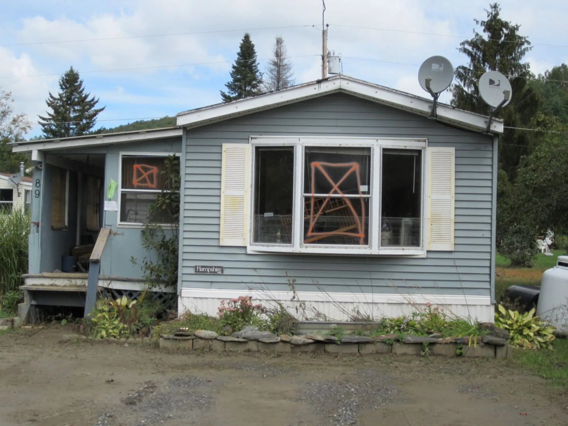 A flooded home in a mobile home park in Berlin, Vermont, after Tropical Story Irene in September 2011