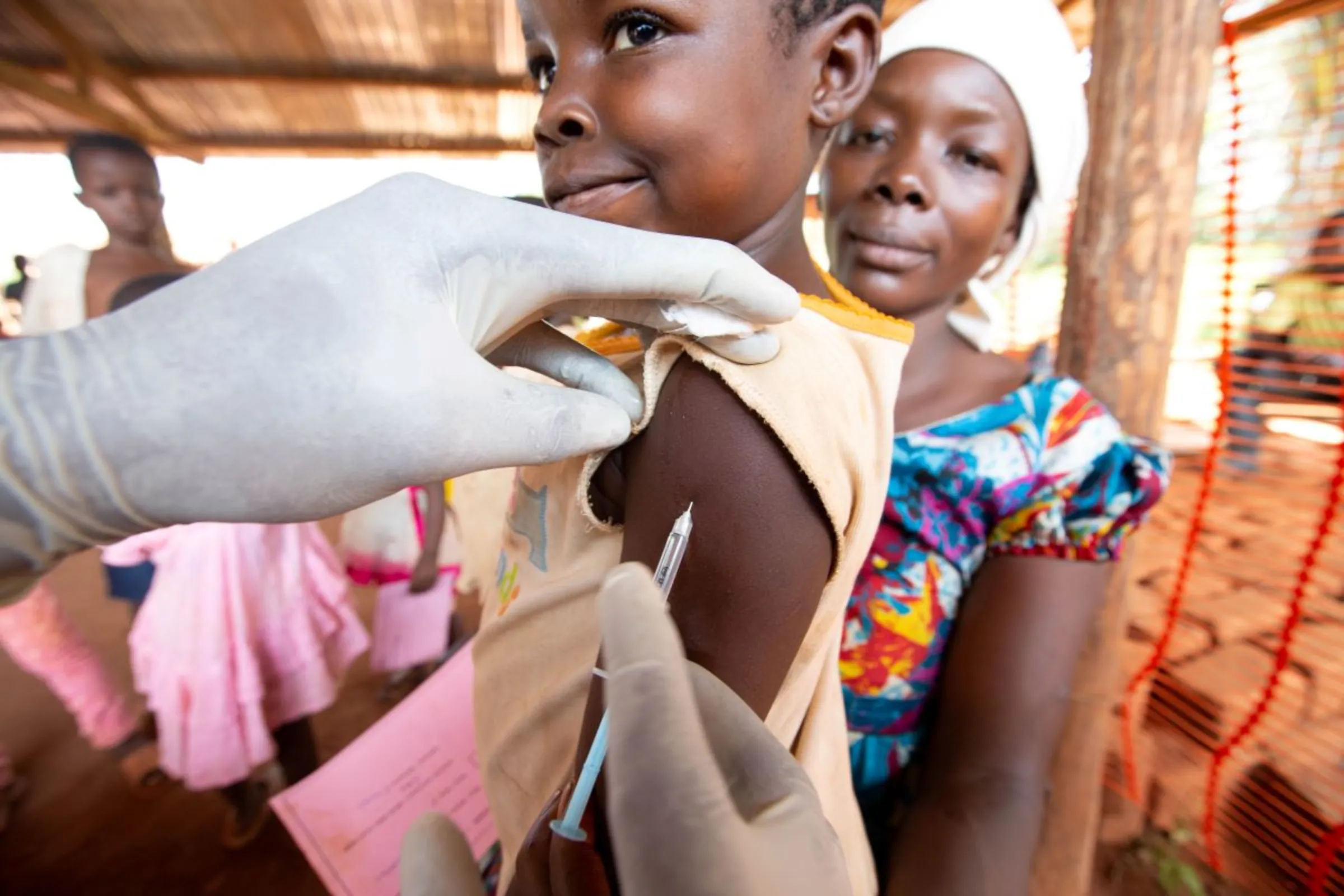 A child is given a measles vaccination during an emergency campaign run by Doctors Without Borders (MSF) in Likasa, Mongala province in northern Democratic Republic of Congo March 3, 2020. REUTERS/Hereward Holland