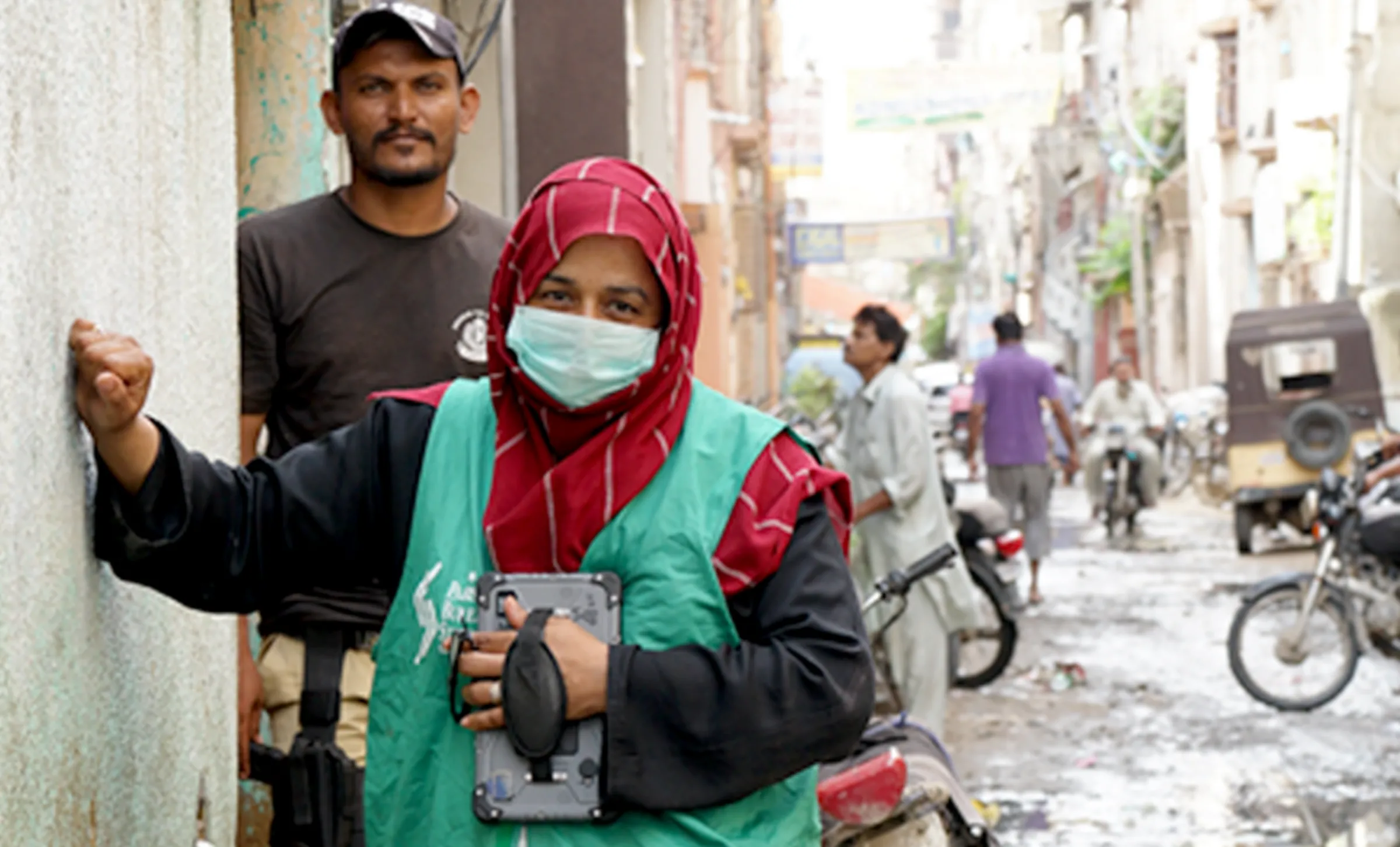 An enumerator during the pilot phase of the digital census in Karachi, Pakistan