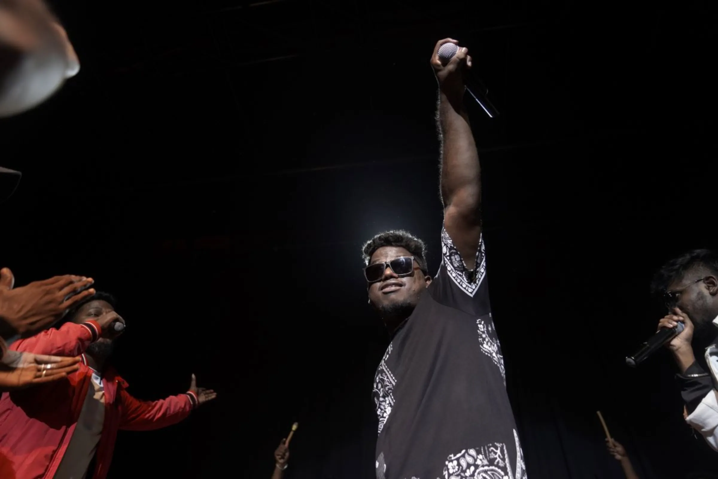 The hip hop artist Arivu on stage during a performance in Chennai, India, December 30, 2022. Karthik Raja Karuppusamy/Handout via Thomson Reuters Foundation