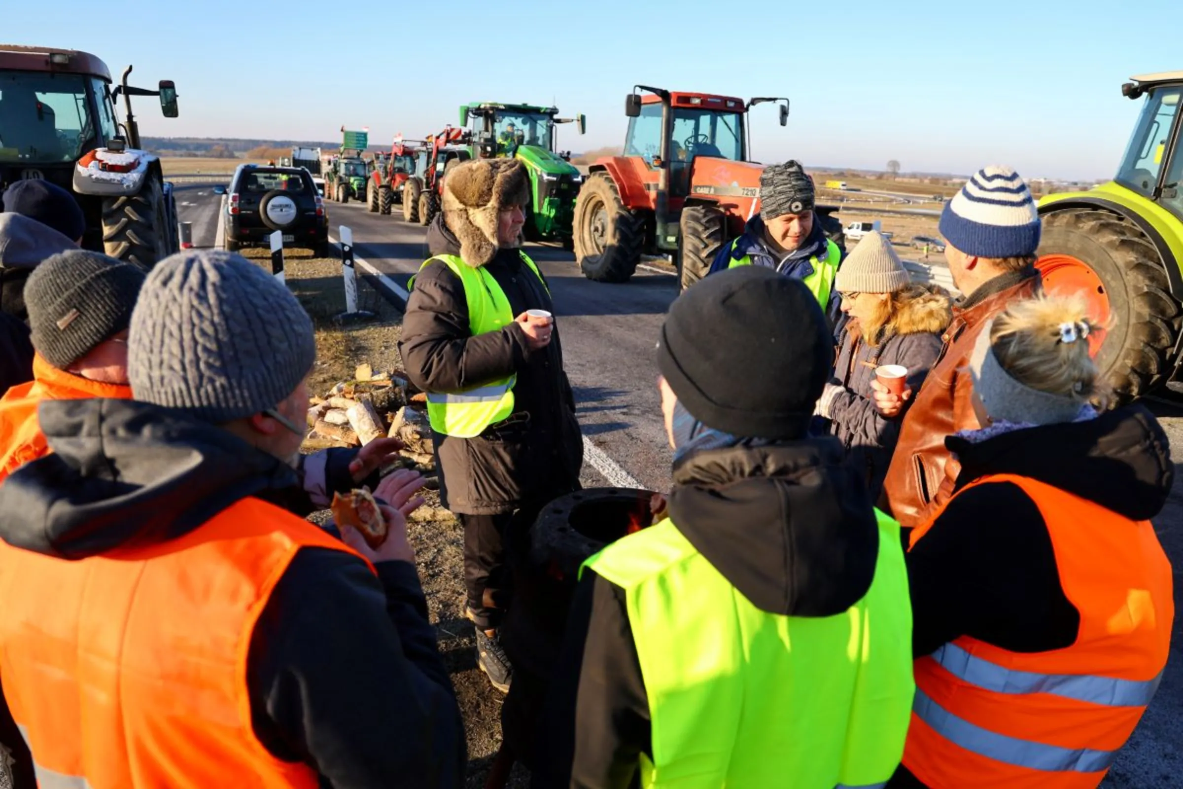 German farmers block access to highway A10 during a protest against government cuts to vehicle tax subsidies, in Vehlefanz, Germany, January 8, 2024. REUTERS/Fabrizio Bensch