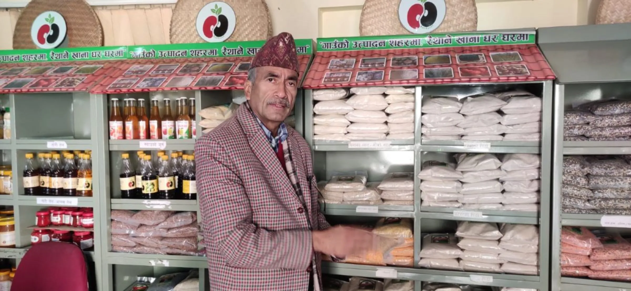 Tilak Dhakal poses for a photo at his shop in Kathmandu, Nepal, January 8, 2023