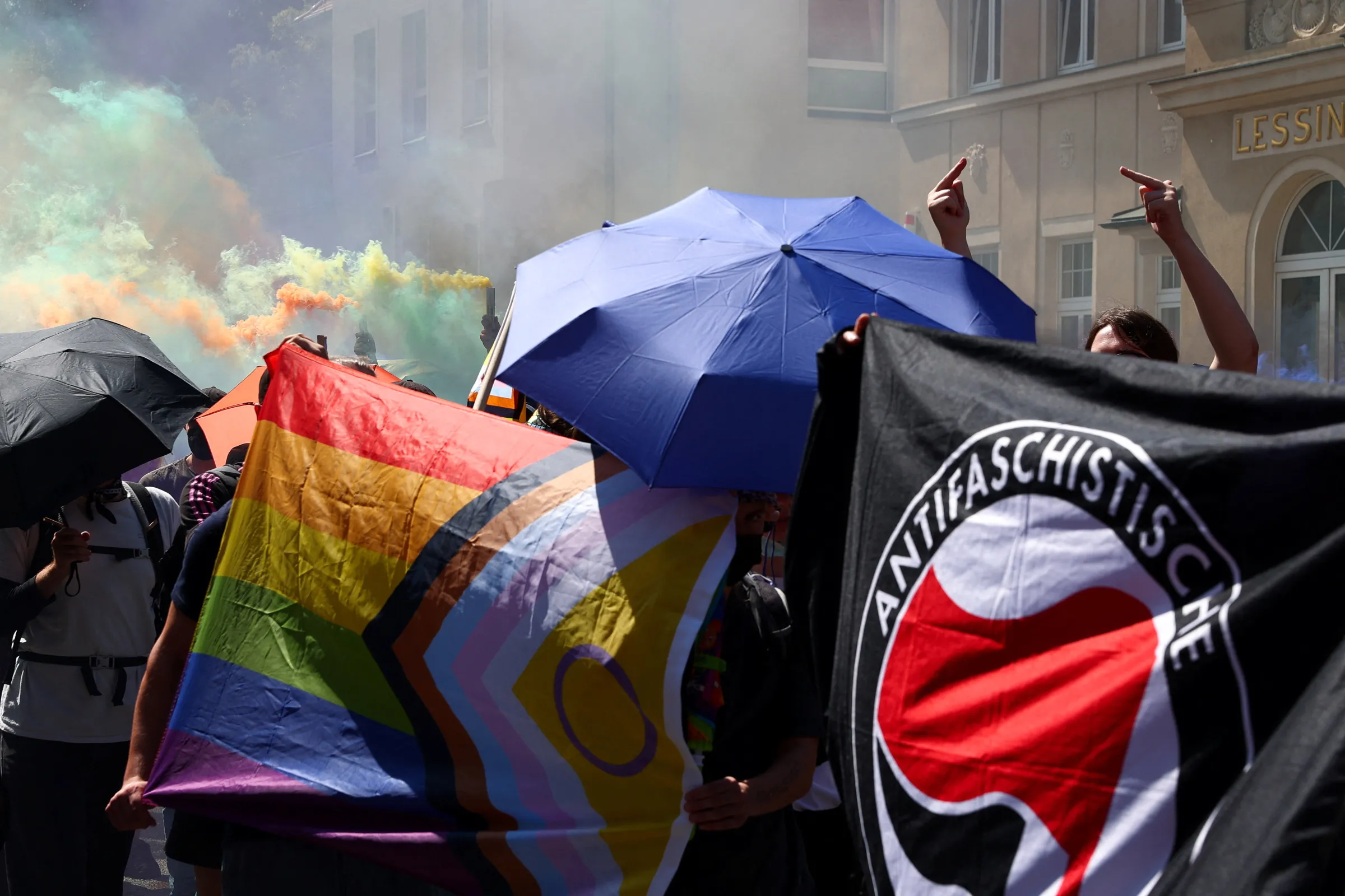 A person gestures towards right-wing counter-protesters, during the annual Christopher Street Day (CSD) LGBTQ+ Pride march, in Bautzen, Germany, August 10, 2025. REUTERS/Christian Mang