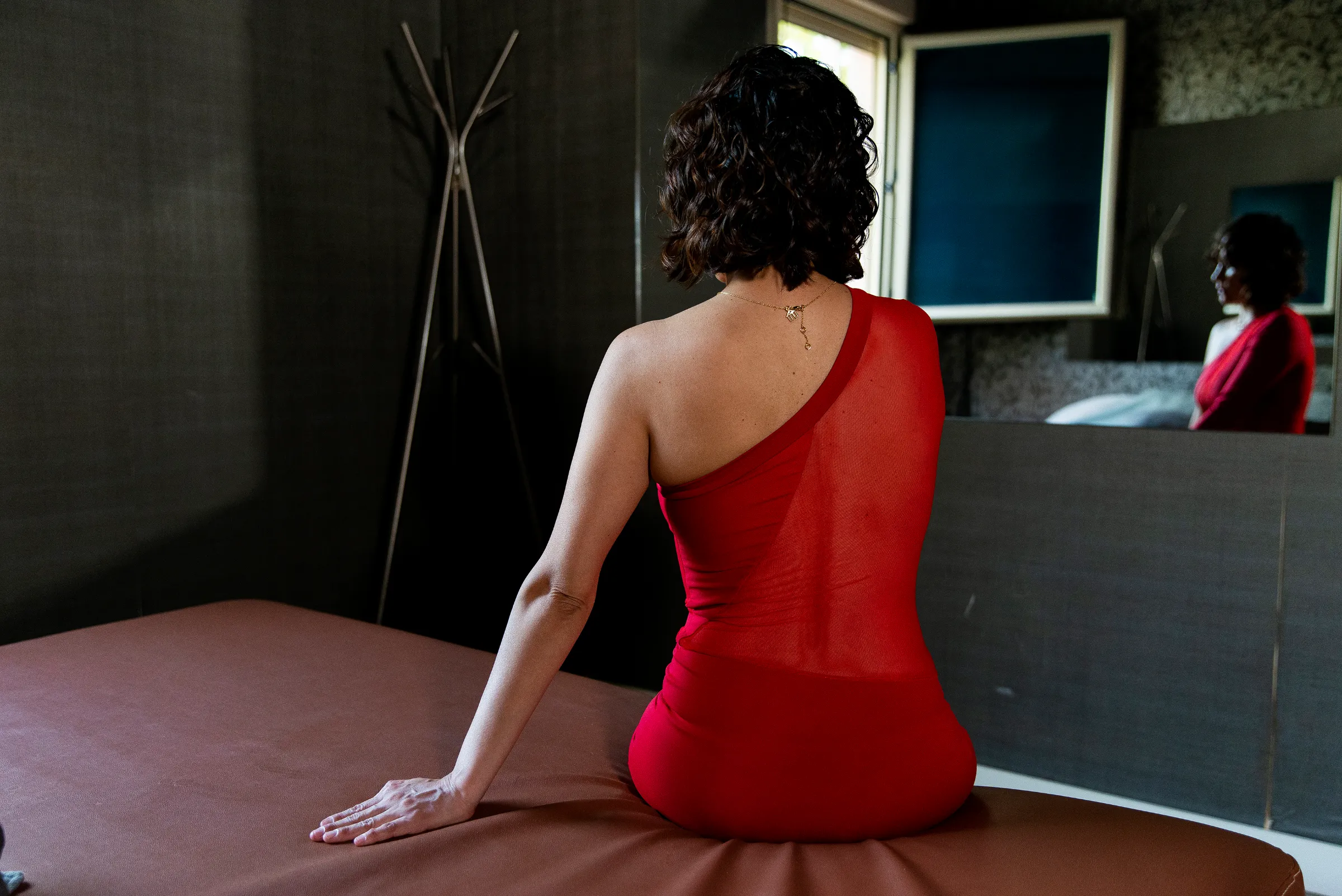 'Ángela' a sex worker waits to meet a client at a hotel in Madrid, Spain. October 2022