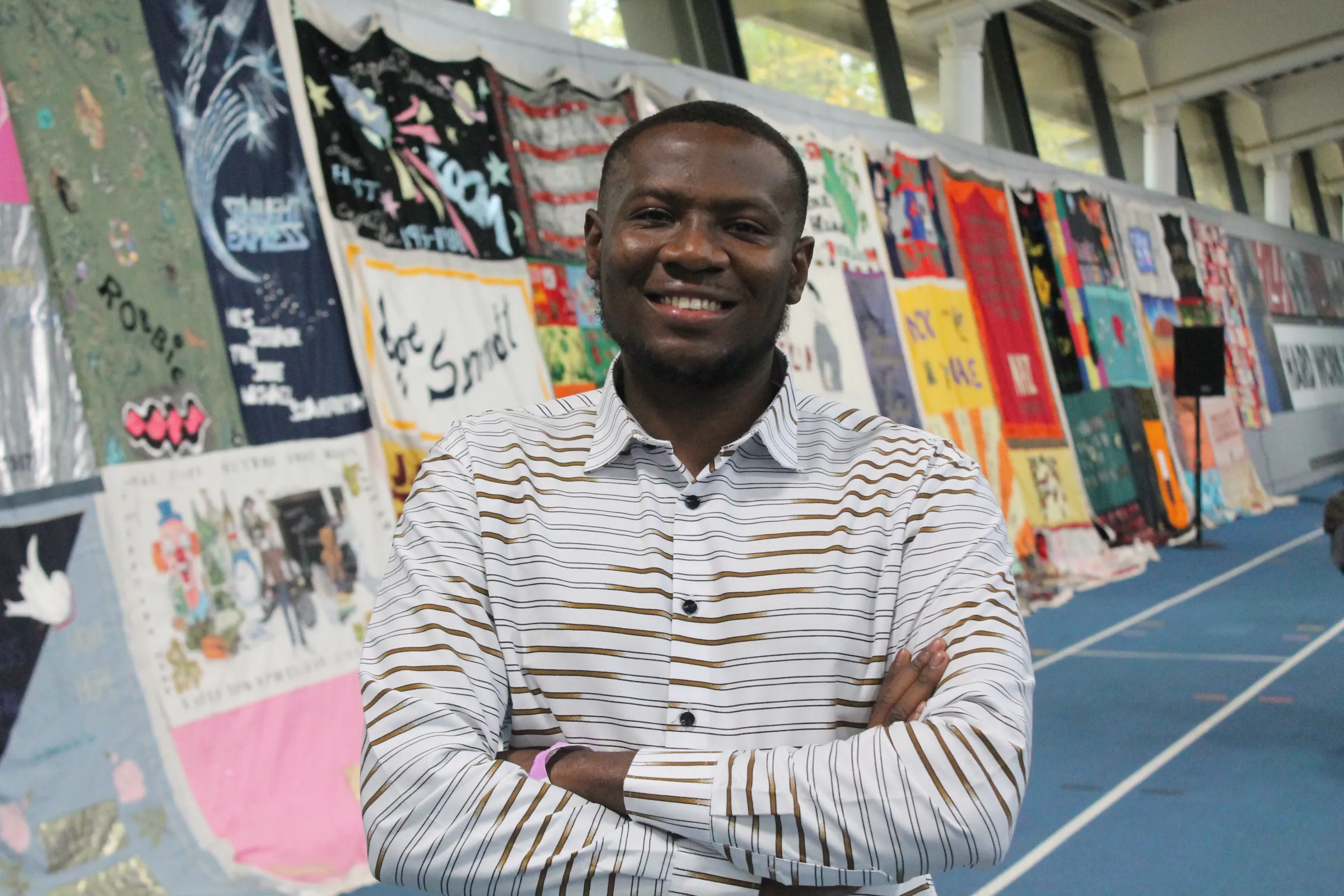 Ghanaian public health advocate Clarkson Afram poses for a photo after an interview with the Thomson Reuters Foundation on the sidelines of the Safer To Be Me Conference, a global LGBTQ+ rights gathering, in Gateshead, United Kingdom, on October 24, 2025. Thomson Reuters Foundation/Enrique Anarte
