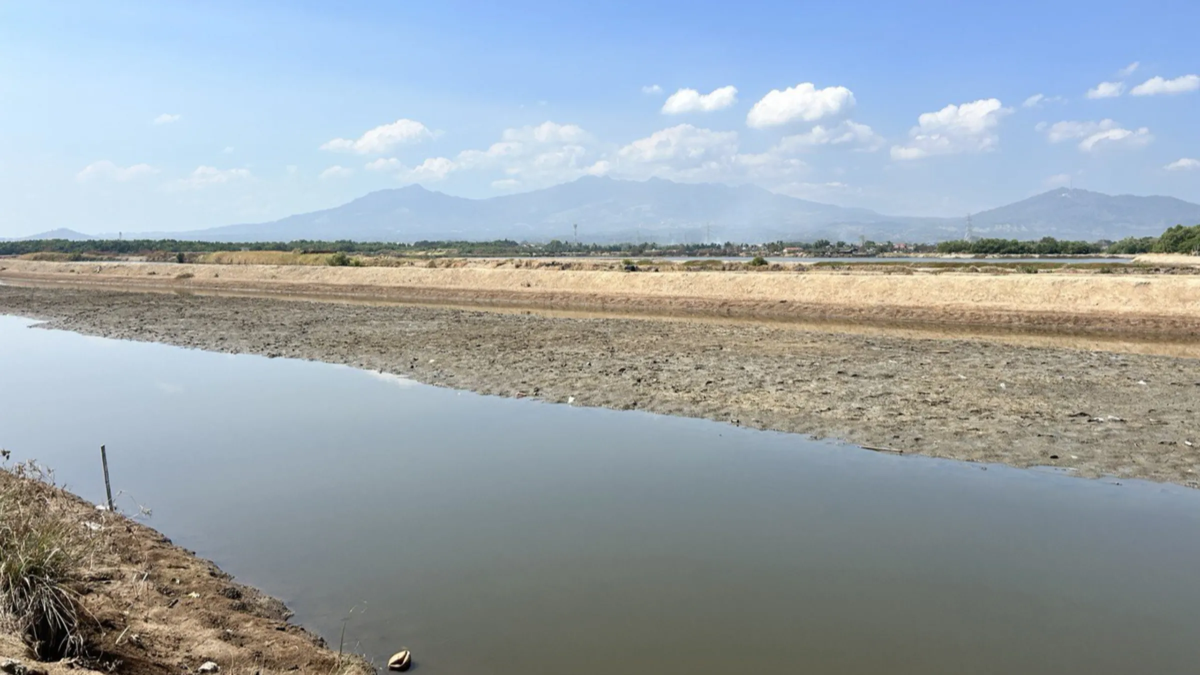 An abandoned fishpond in Orion town, Bataan, Philippines. February 27, 2024. Thomson Reuters Foundation/Mariejo Ramos