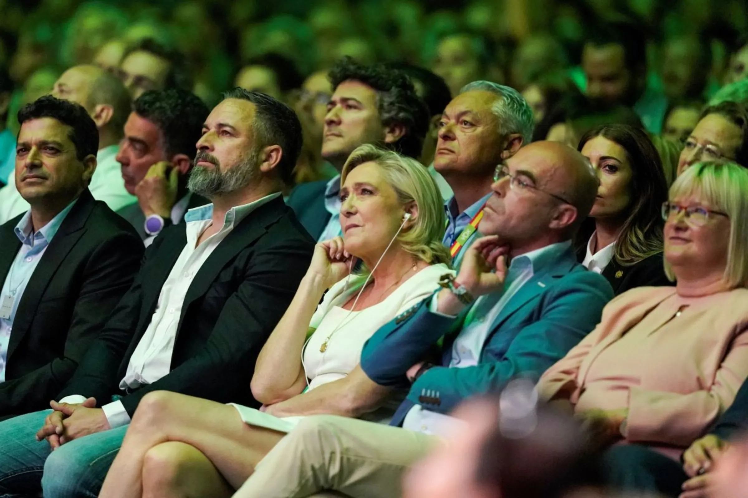 Spanish far-right Vox party leader Santiago Abascal and president of the France's National Rally party Marine Le Pen attend a rally organised by the Vox party ahead of the European elections, in Madrid, Spain, May 19, 2024. REUTERS/Ana Beltran