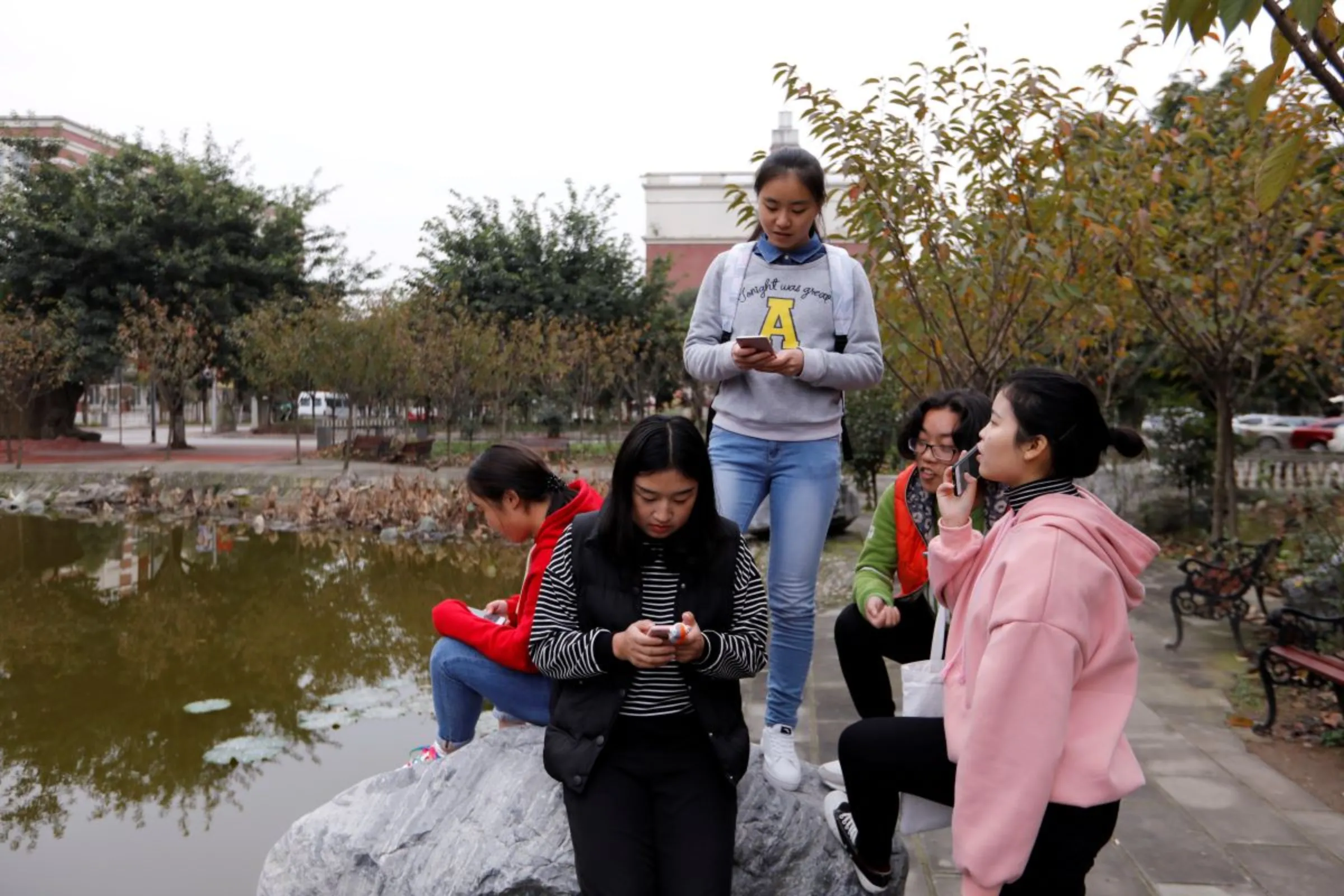 Students majoring in esports and management play games on their phones at the campus of the Sichuan Film and Television University in Chengdu, Sichuan province, China, November 19, 2017