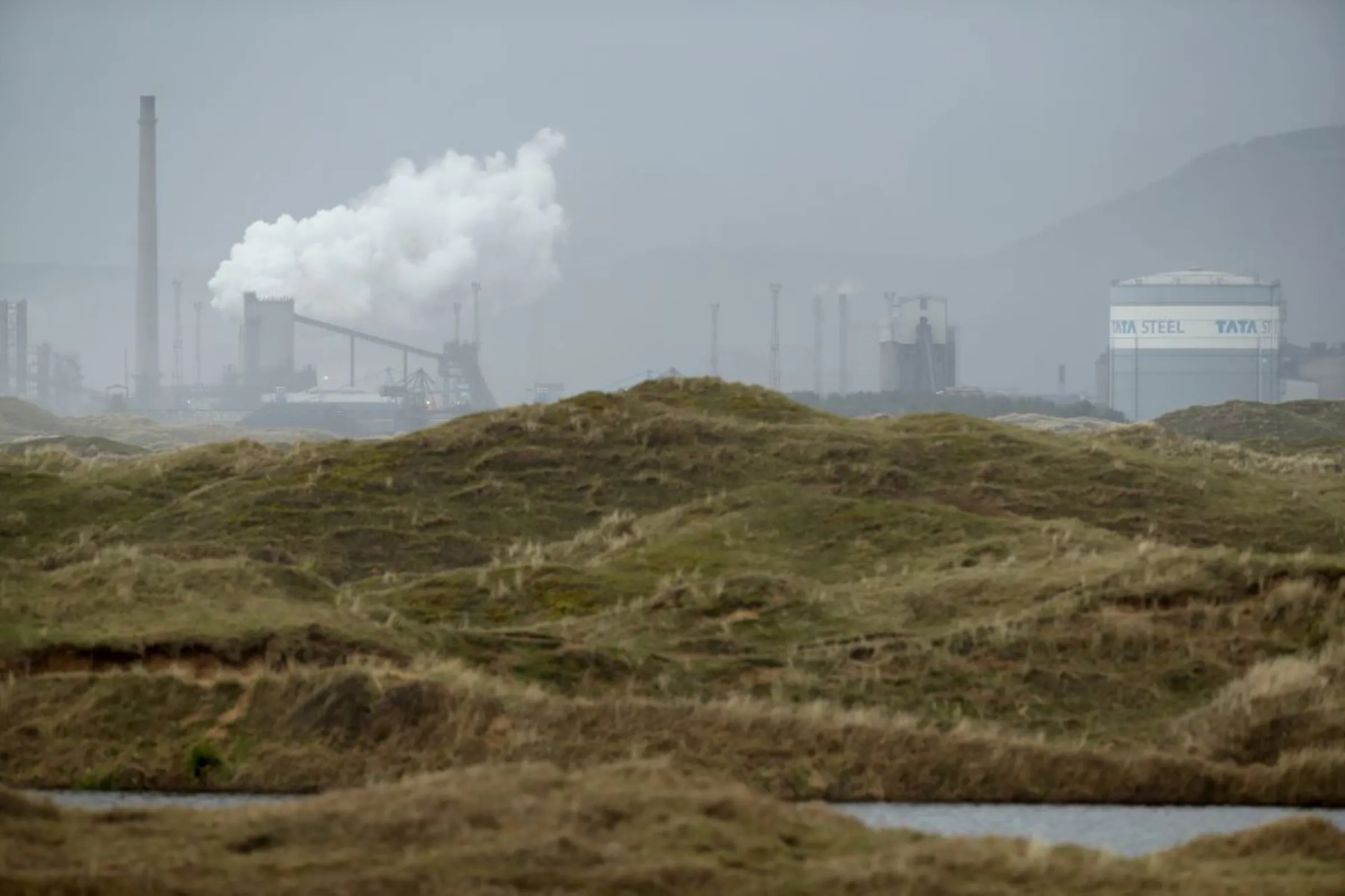 Tata Steel steelworks are seen on the South Wales coastline, Port Talbot, Britain, February 24, 2021. REUTERS/Peter Cziborra