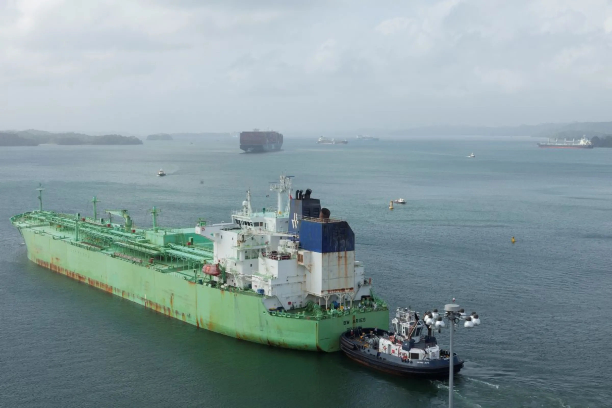 A liquefied natural gas tanker transits through Gatún Lake, which provides drinking water for around 2.5 million Panamanians, Panama, February 16, 2024. Thomson Reuters Foundation/Enea Lebrun.