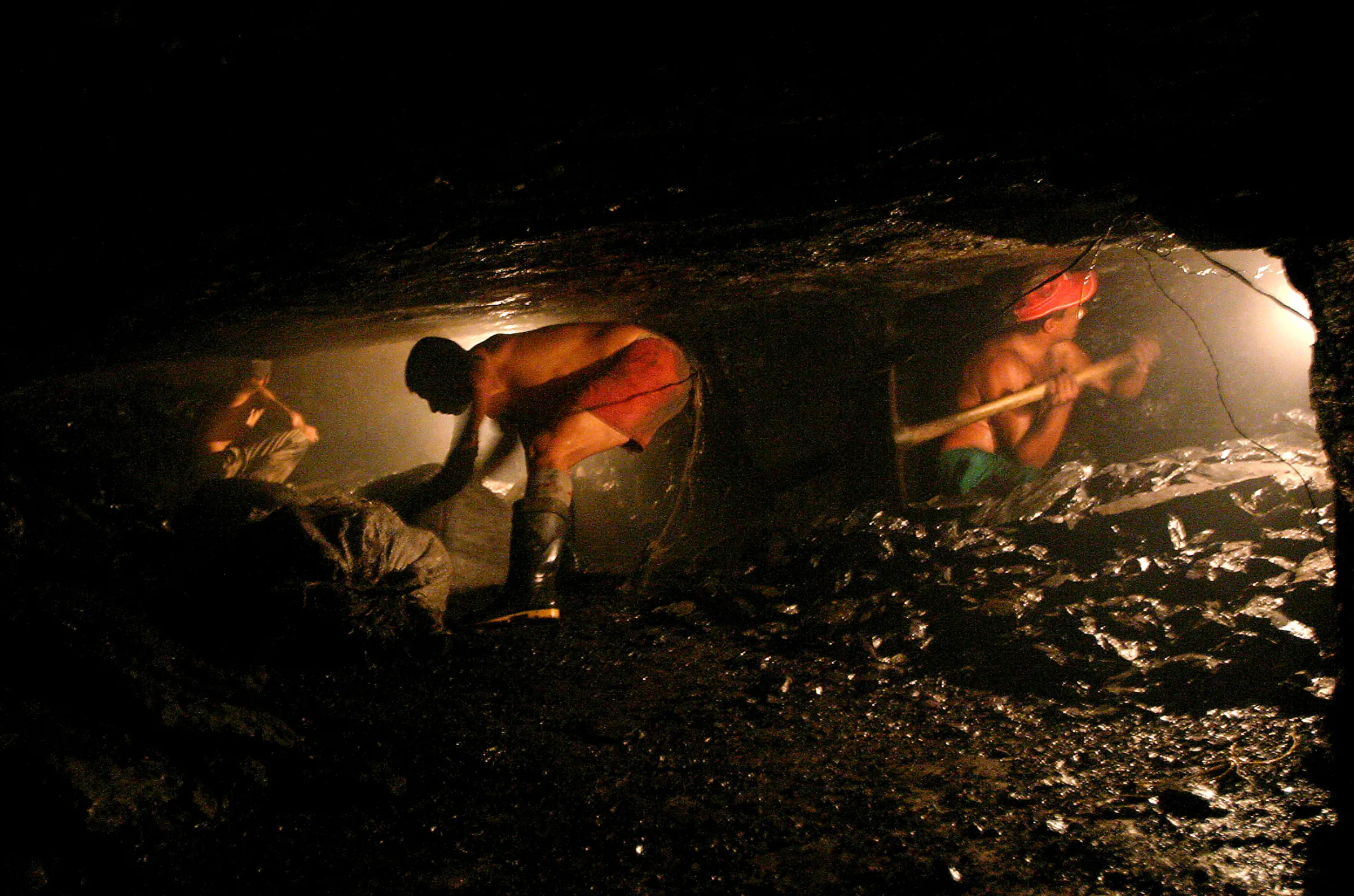Colombian miners work in a 150-year-old coal mine in Argelia