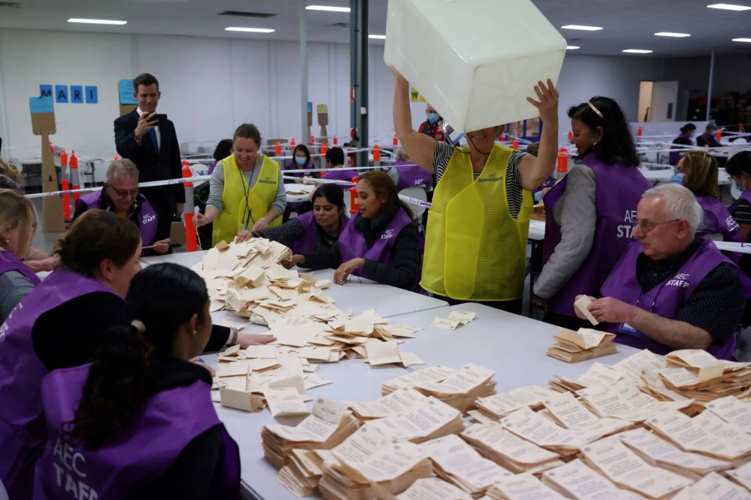 AEC staff are seen at a vote counting centre during The Voice referendum in Melbourne, October 14, 2023. AAP Image/Con Chronis via REUTERS