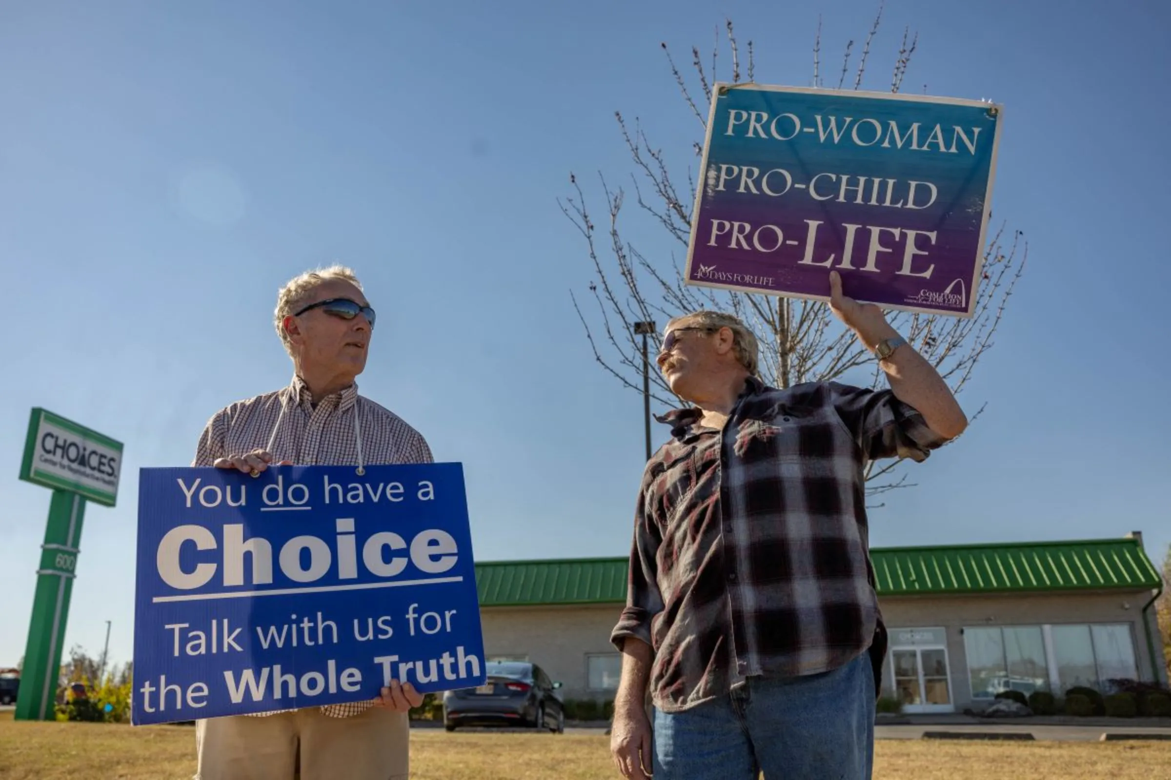 Anti-abortion demonstrators protest outside a clinic called Choices in Carbondale, Illinois, U.S., November 2, 2022. REUTERS/Evelyn Hockstein