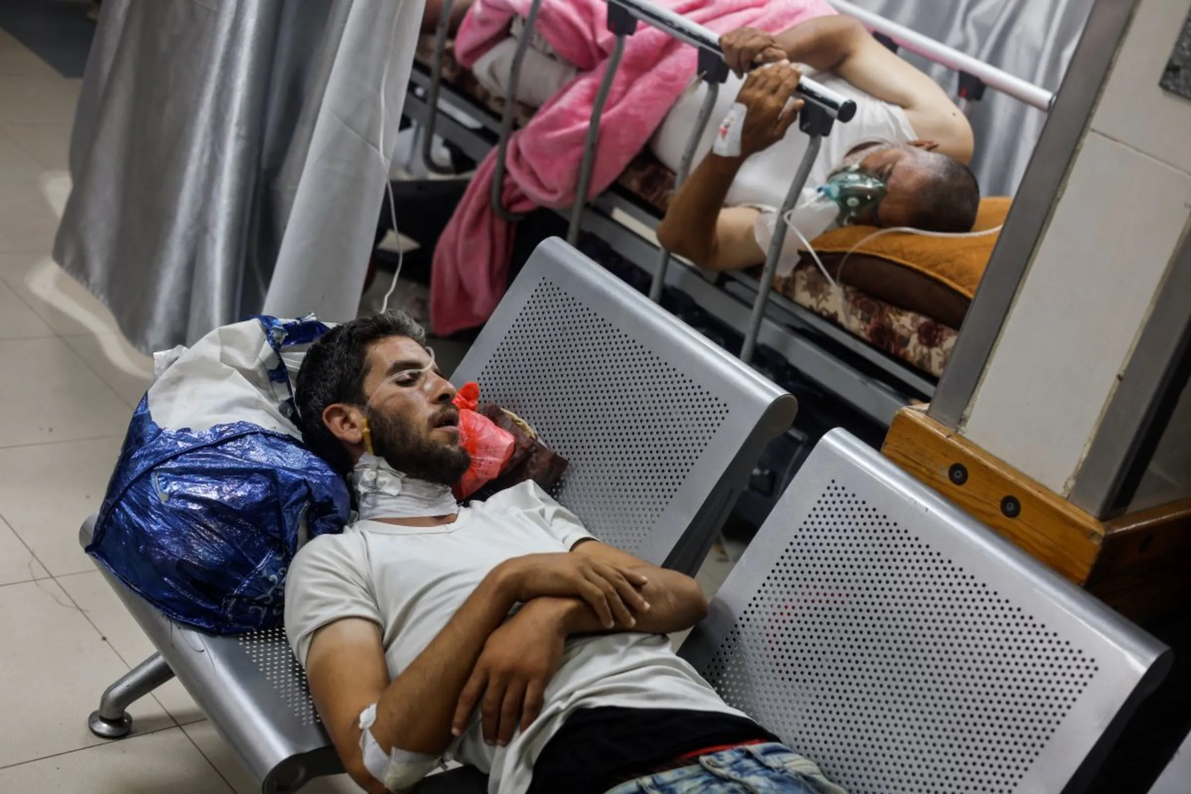 Wounded Palestinians lie down at Nasser Hospital in Khan Younis in the southern Gaza Strip July 2, 2024. REUTERS/Mohammed Salem