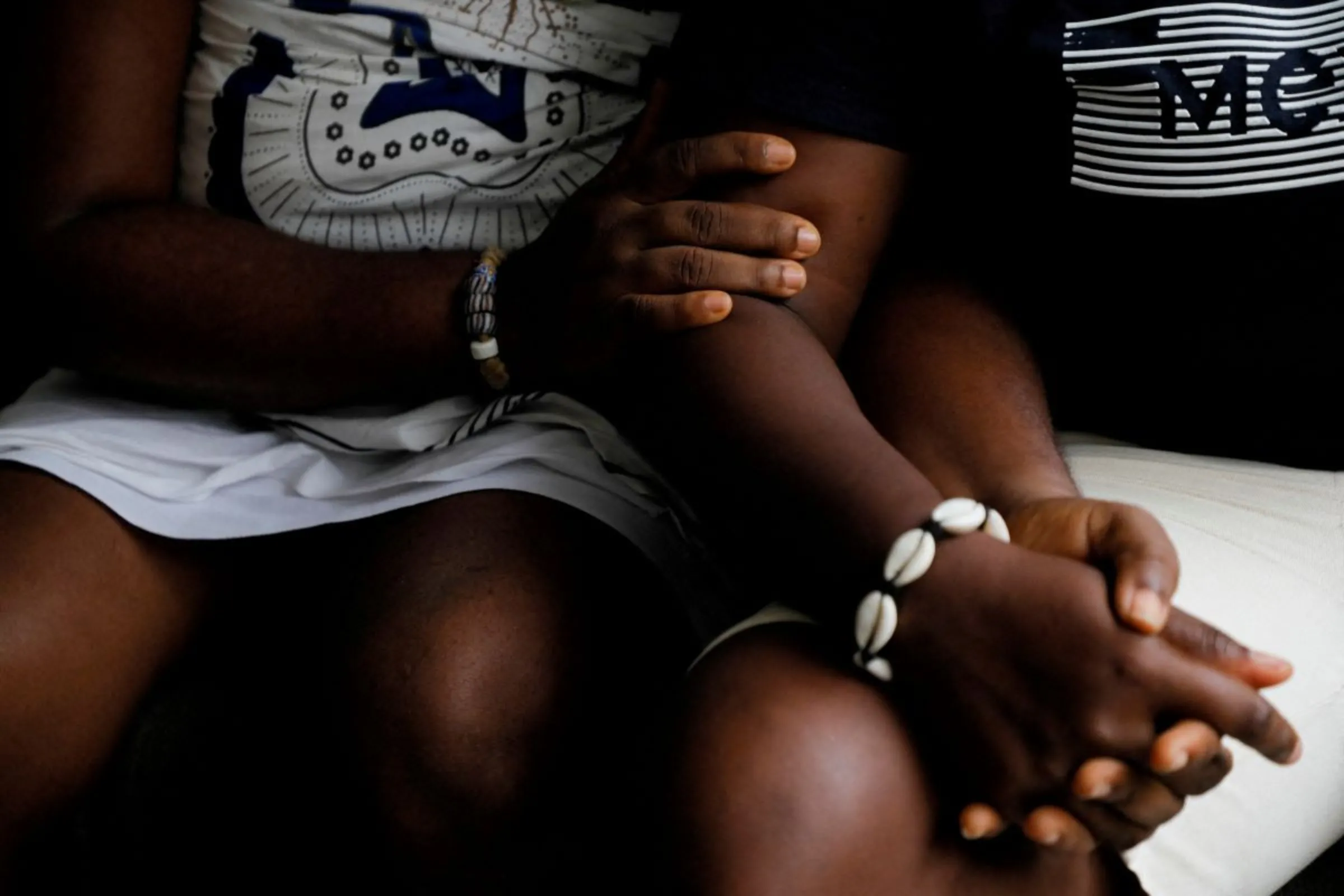 A same-sex couple sit together during a discussion on a Declaration approved by Pope Francis, that allows Catholic priests to bless same-sex couples, in Accra, Ghana. January 23, 2024. REUTERS/Francis Kokoroko