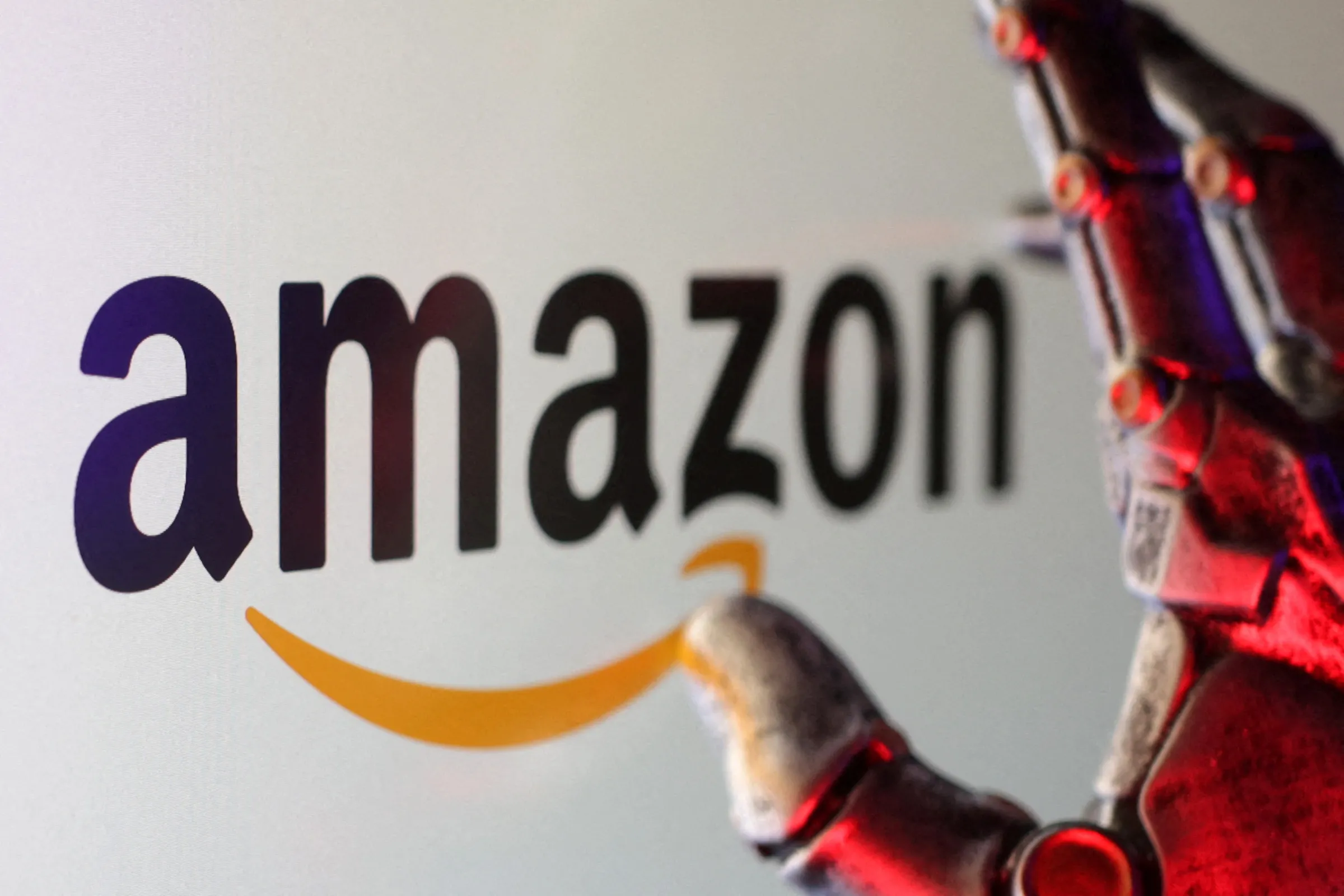 The Amazon logo is seen in this illustration from February 16, 2025. REUTERS/Dado Ruvic/Illustration