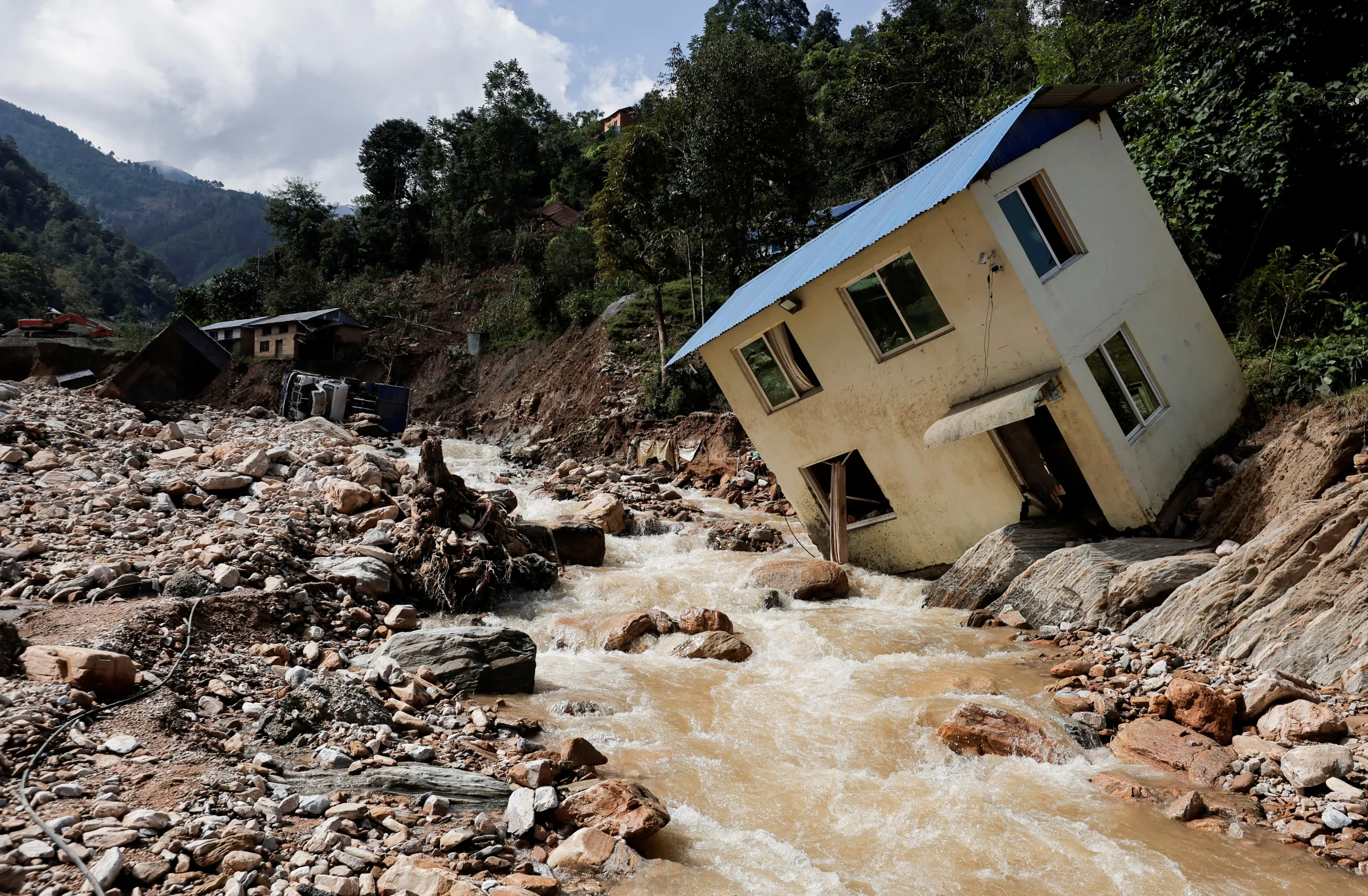 A view of damaged houses after the deadly floods following heavy rainfall, along the bank of Kalati River, in Bhumidanda village of Panauti municipality, in Kavre, Nepal October 1, 2024. REUTERS/Navesh Chitrakar