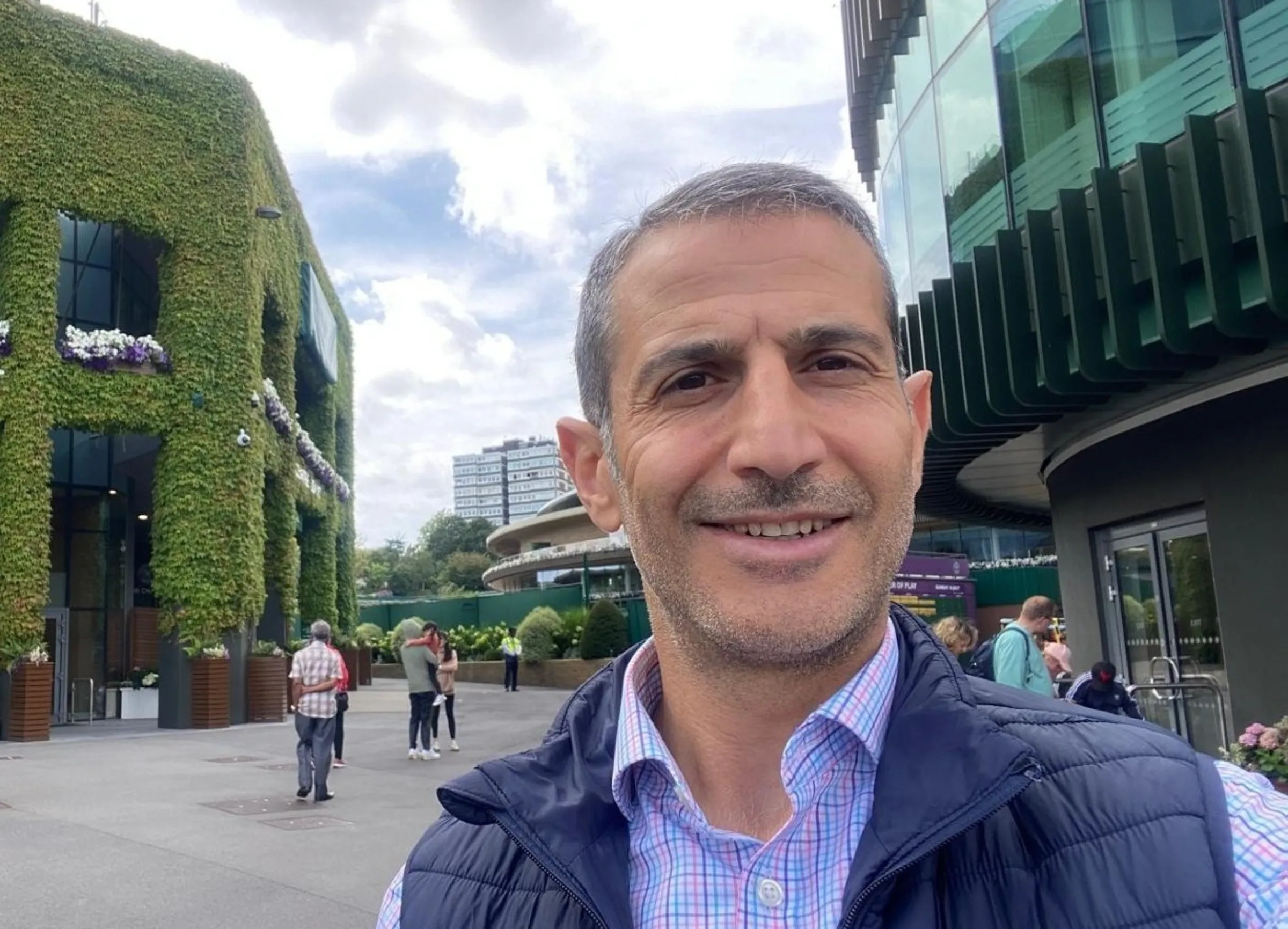 Syrian journalist Diaa Sawan is pictured in the grounds of the Wimbledon tennis championships in London, Britain in 2025. Diaa Sawan/Handout via Thomson Reuters Foundation