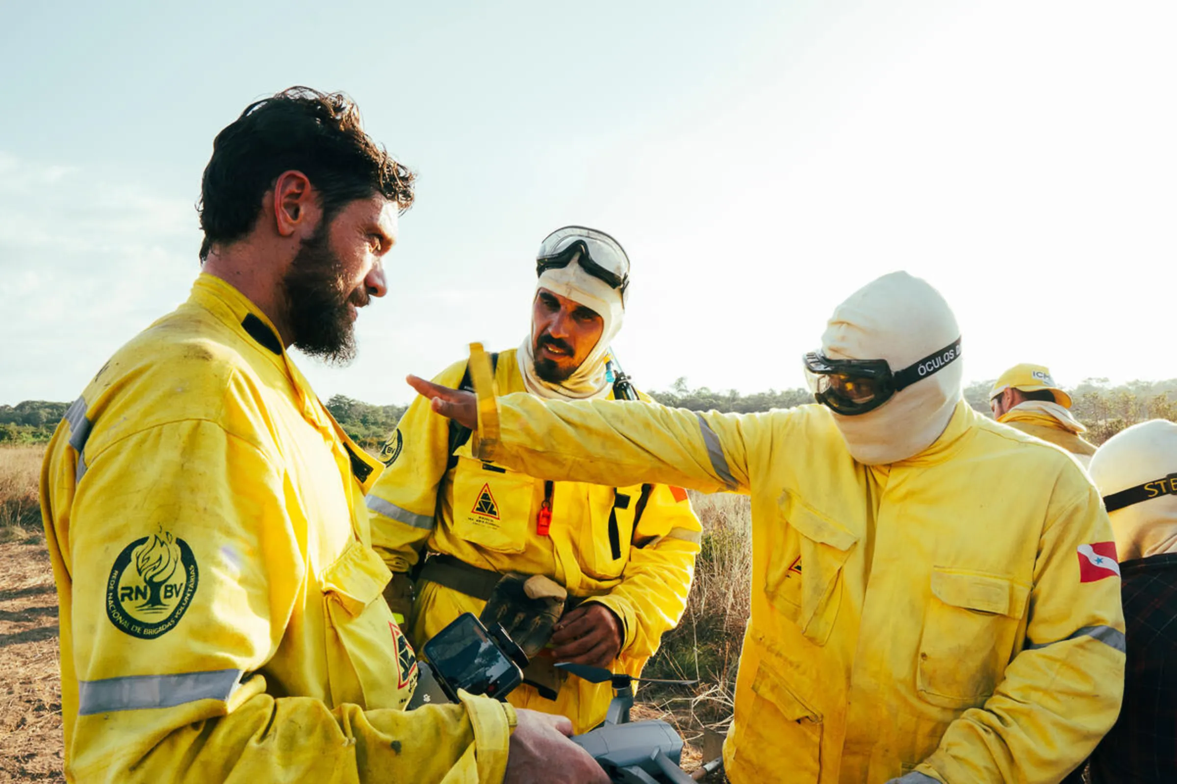 Firefighters from the Bridada de Alter discuss their work in Alter do Chao, Para State, Brazil. August 1, 2024. Brigada de Alter/Handout via Thomson Reuters Foundation