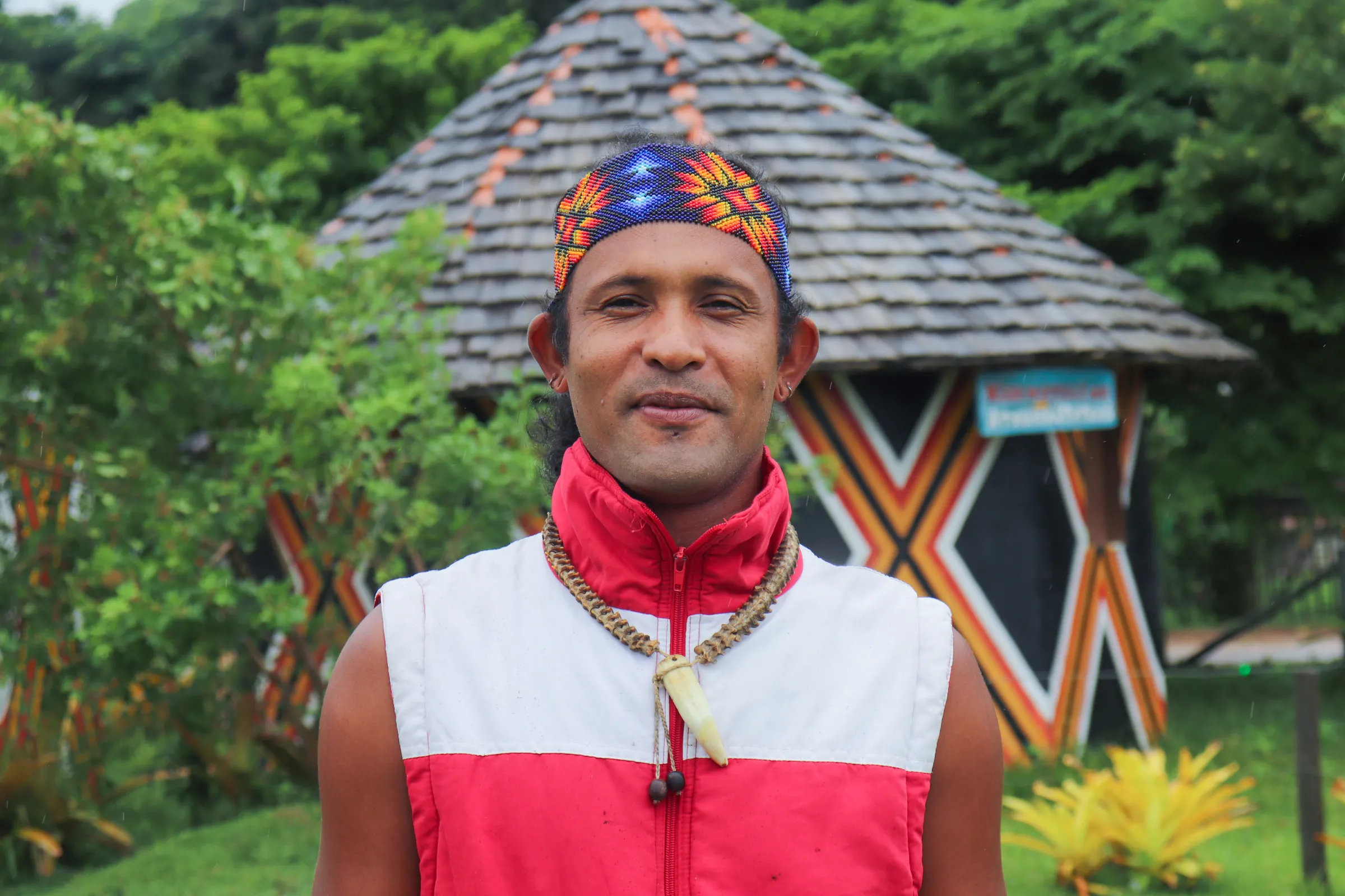 Indigenous leader Ytapuã Pataxó poses at the Aldeia Velha territory, near Arraial D'Ajuda in Porto Seguro district, Brazil, April 22, 2023. Thomson Reuters Foundation/Rogério Naba