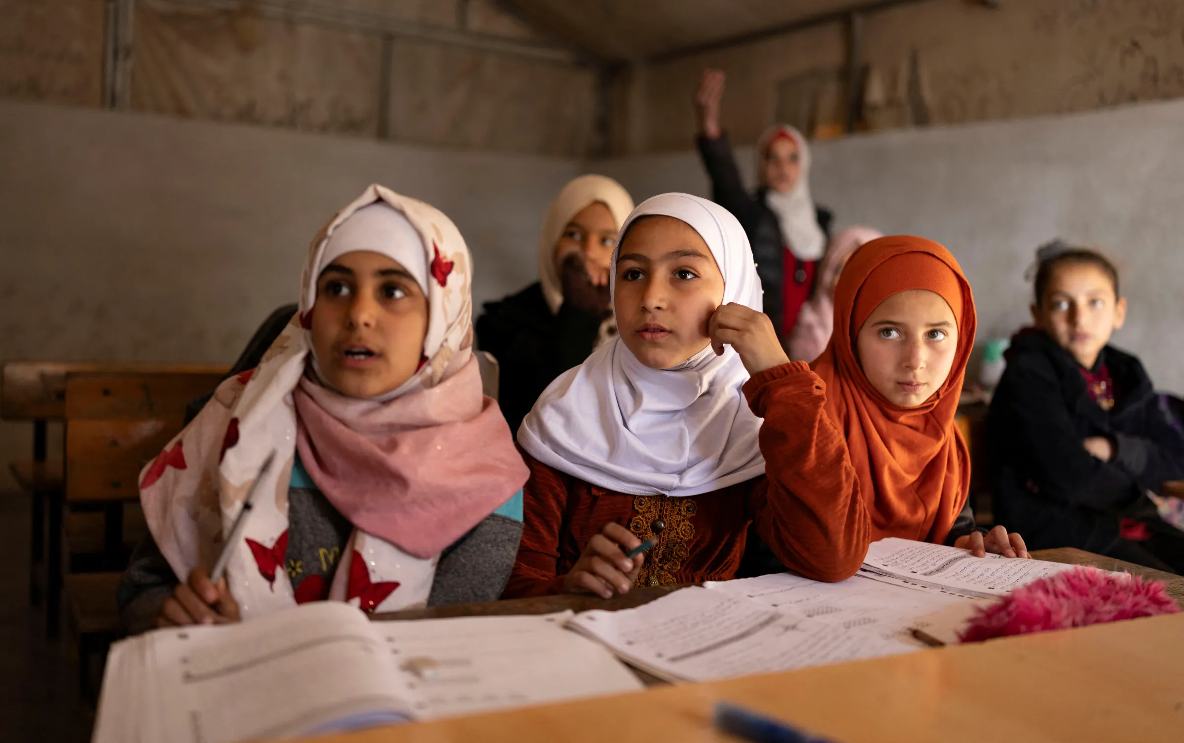 Children attend a class in a primary school at refugee camp in Idlib, Syria, December 17, 2024. REUTERS/Umit Bektas
