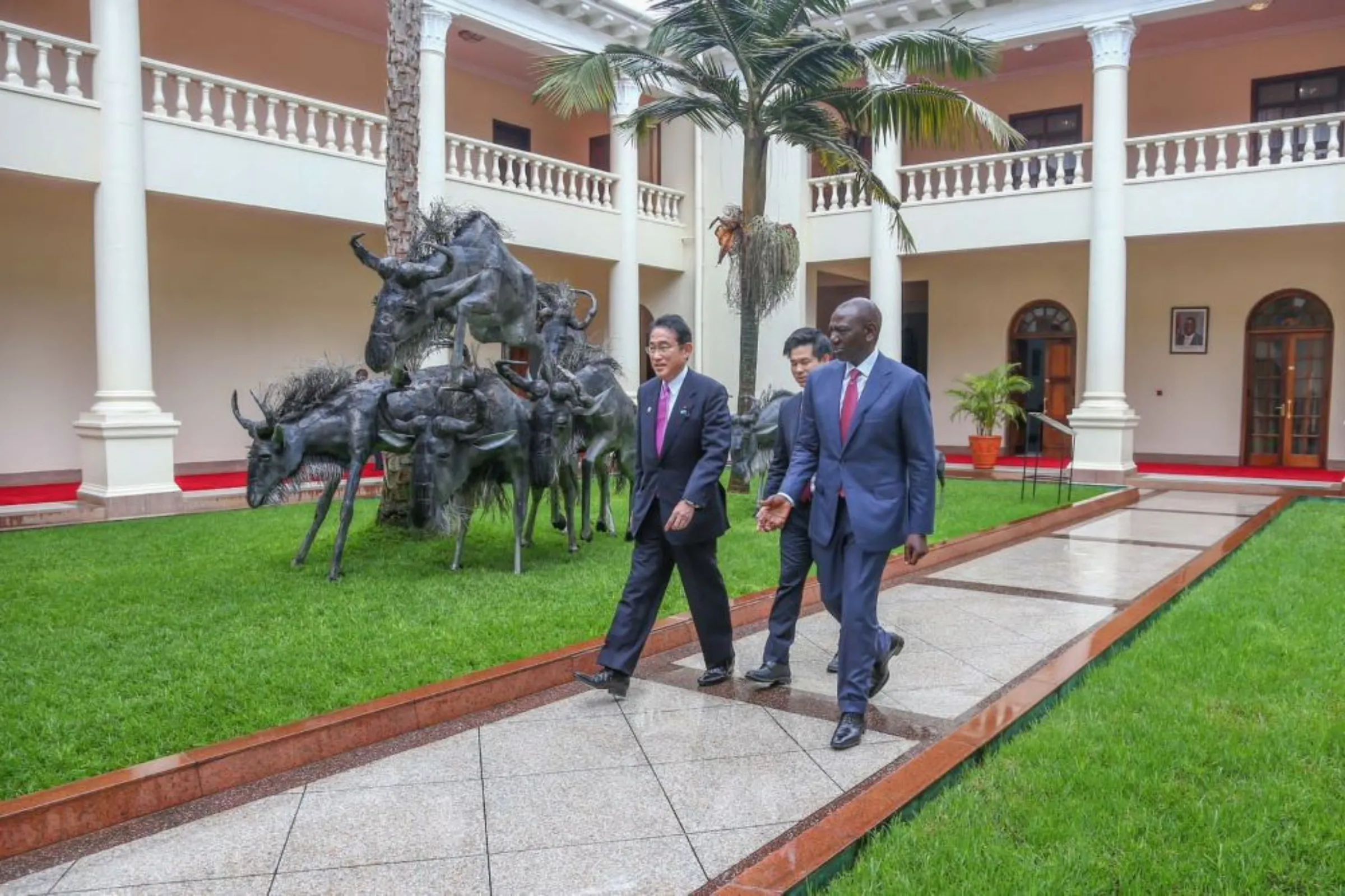 Kenya's President William Ruto walks with Japanese Prime Minister Fumio Kishida during his official visit at the State House in Nairobi, Kenya May 3, 2023