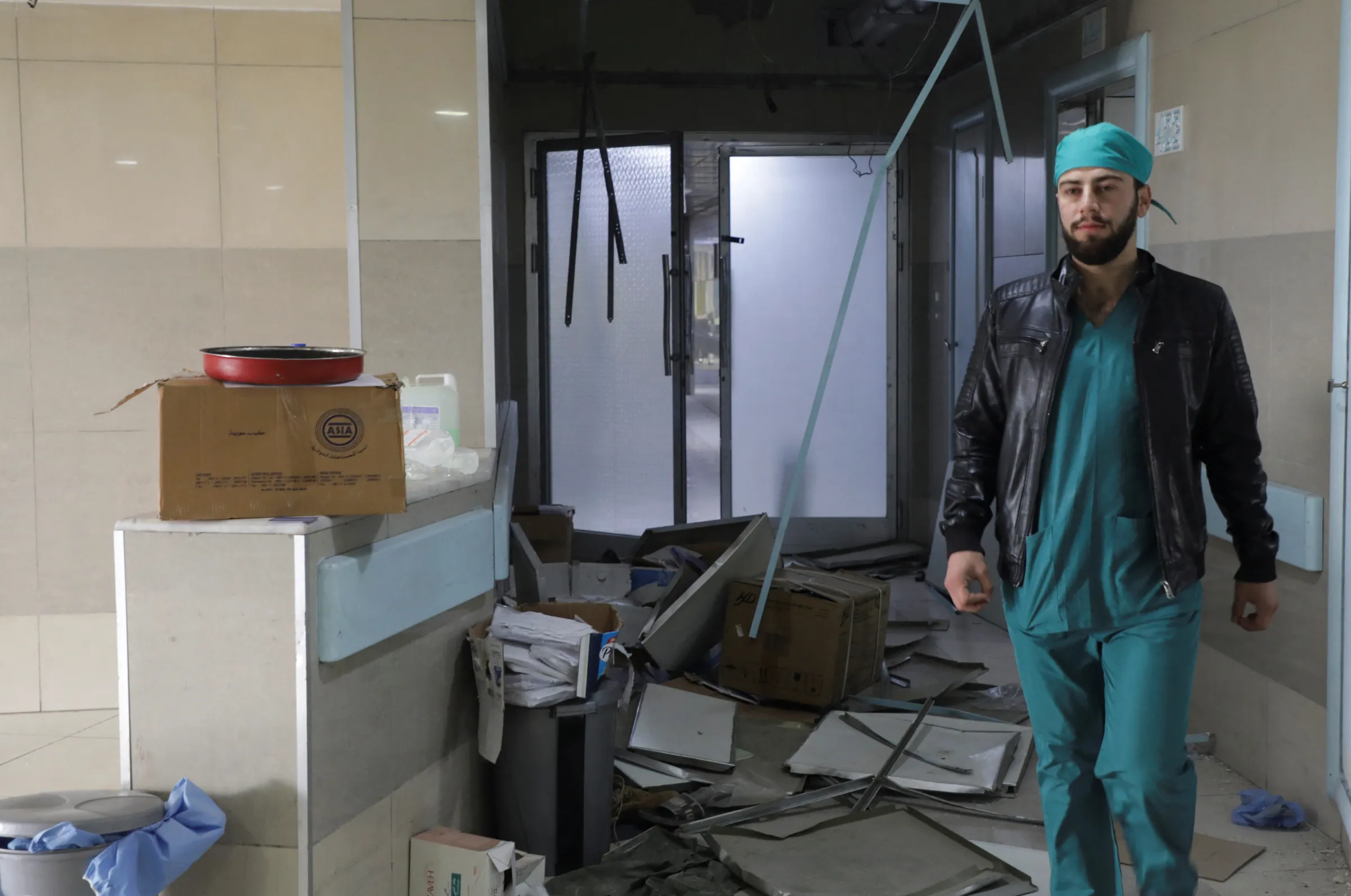 A medical worker walks inside the Aleppo University Hospital that is damaged by strikes, after rebels have staged a whirlwind advance over the past week, seizing Aleppo and much of the surrounding countryside, in Syria December 4, 2024. REUTERS/Mahmoud Hasano