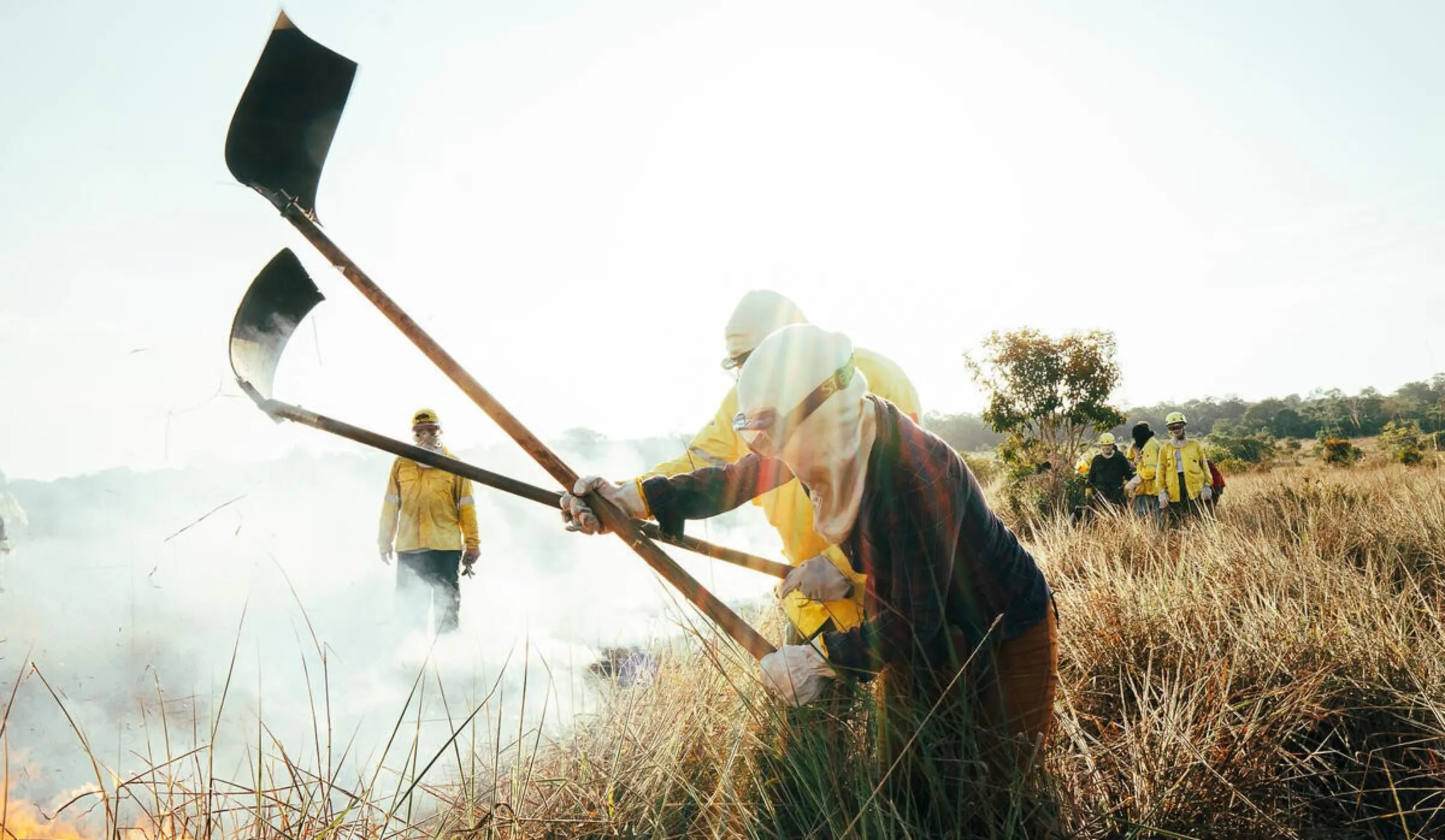 Firefighters from the Bridada de Alter use fire management techniques to protect areas of ecological interest in Alter do Chao, Para State, Brazil. August 1, 2024. Brigada de Alter/Handout via Thomson Reuters Foundation