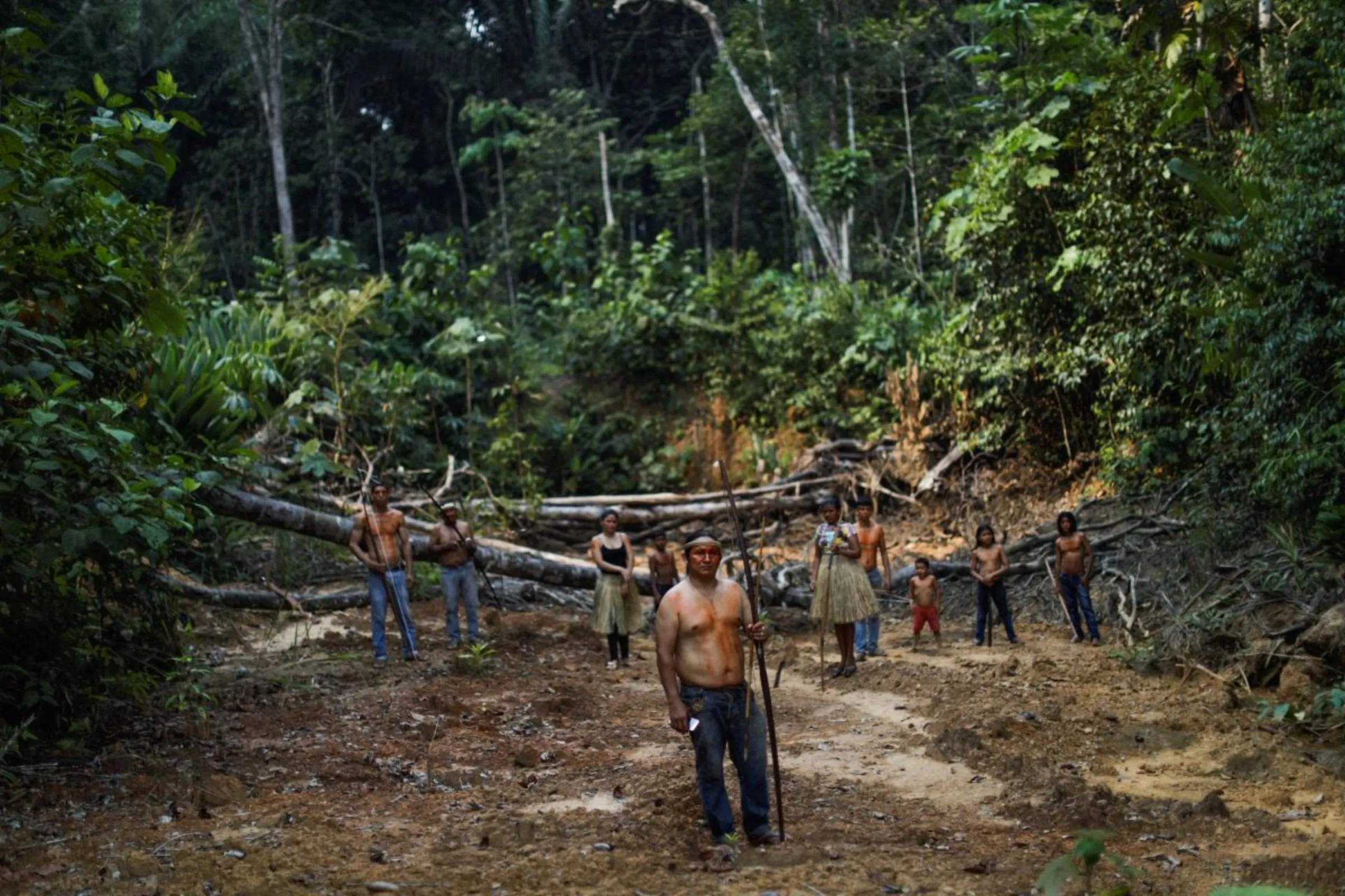 Indigenous Mura people pose for a picture in a deforested area of a non-demarcated indigenous land in the Amazon rainforest near Humaita, Amazonas State, Brazil, August 20, 2019