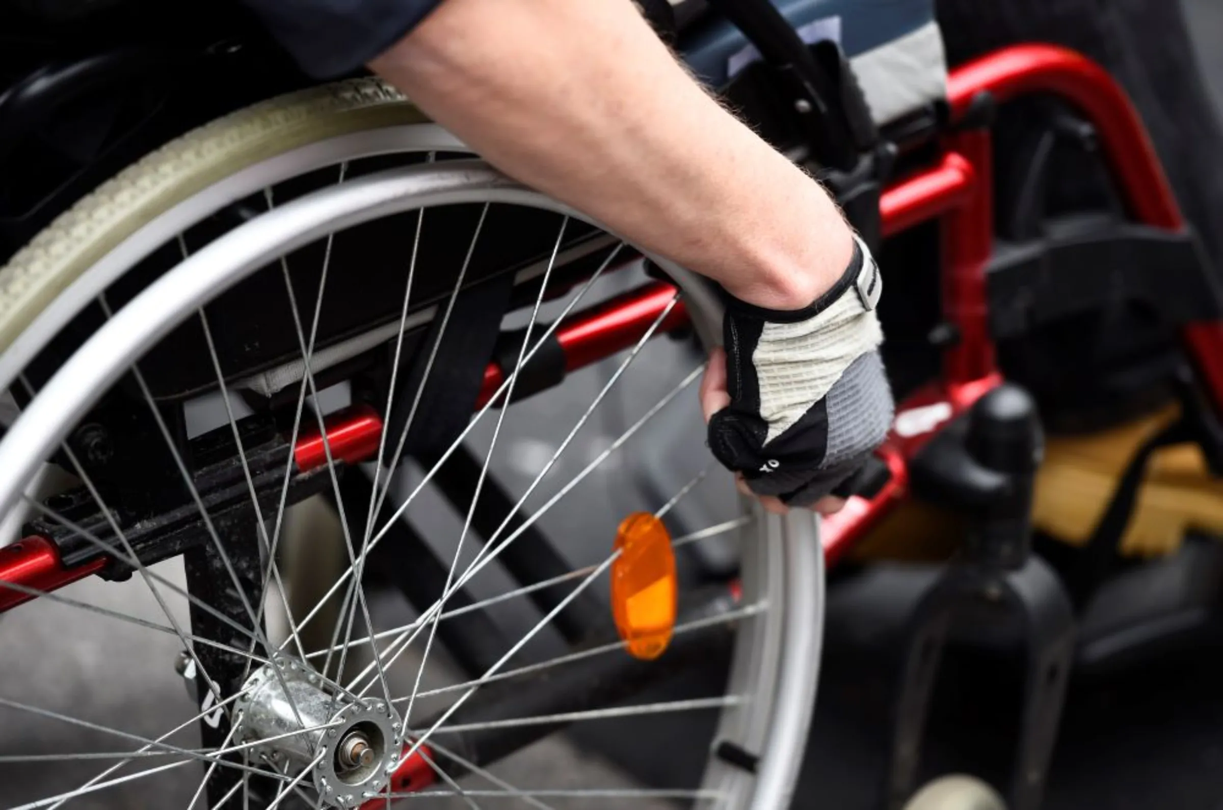 A man in a wheelchair takes part in a protest against cuts to state disability welfare payments in London, Britain, March 23, 2016