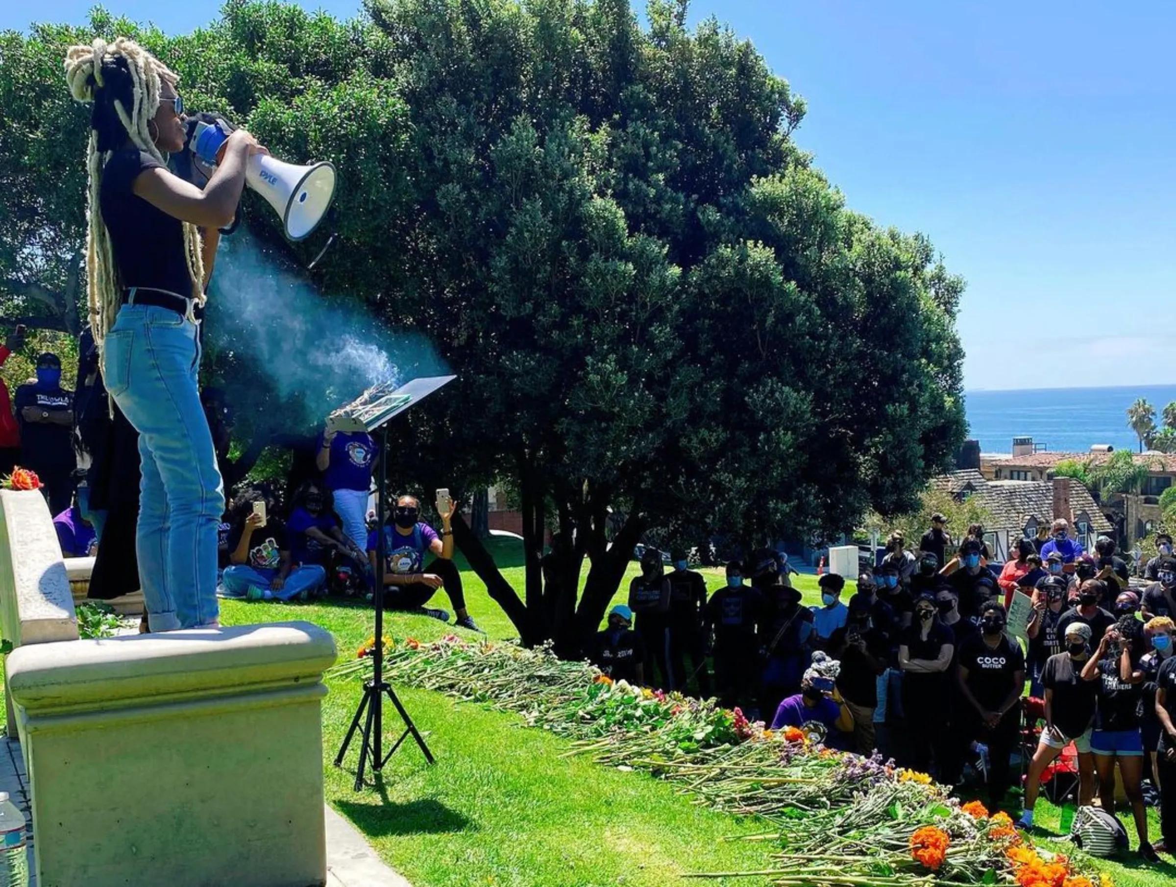 Demonstrators call for the return of Bruce’s Beach to the Bruce family in October 2020 in Manhattan Beach, California.