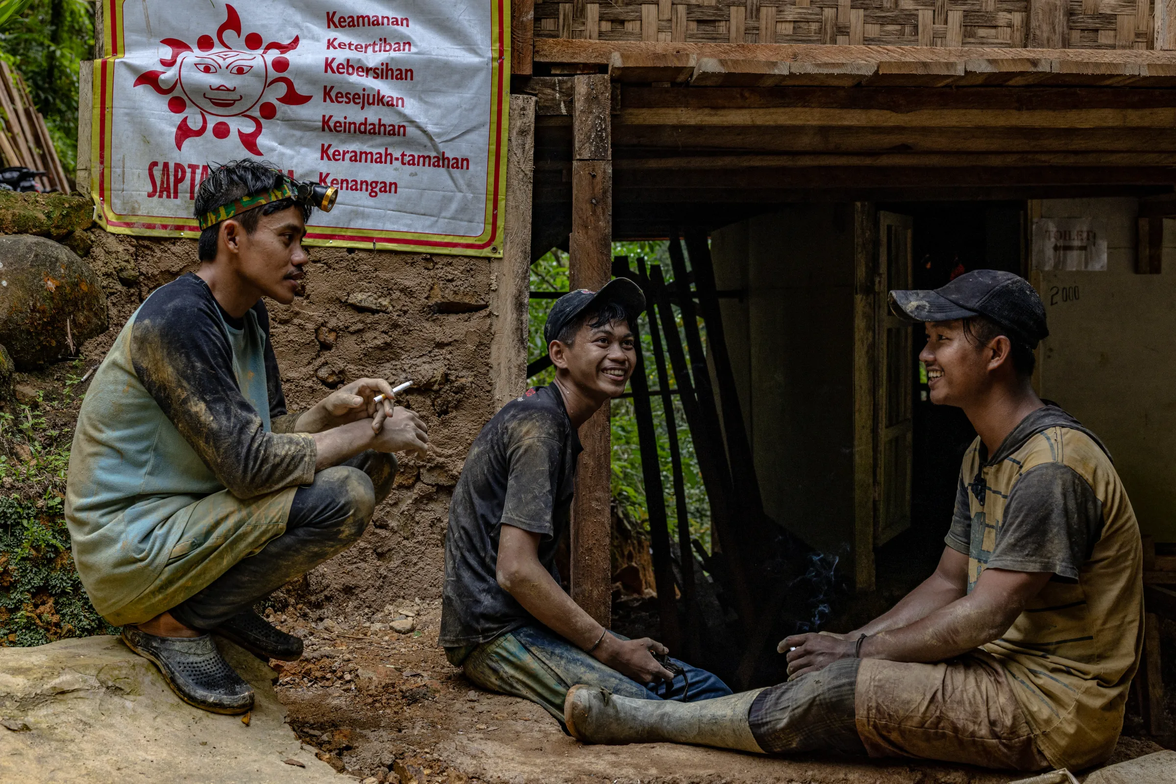 Mine workers are seen taking a break in Citorek Kidul, Banten, Indonesia, July 14, 2025. Thomson Reuters Foundation/Yudha Baskoro