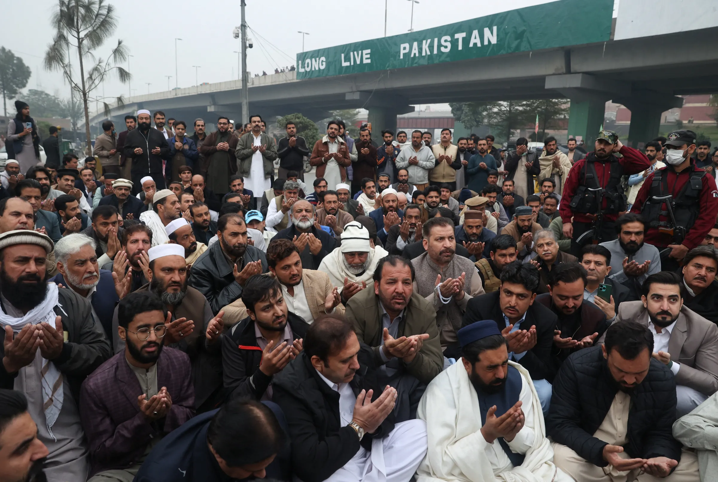 Supporters of the former Pakistani Prime Minister Imran Khan's party, Pakistan Tehreek-e-Insaf (PTI), attend a symbolic prayer for the people the party claims were killed during a protest in Islamabad this week, in Peshawar, Pakistan, November 29, 2024. REUTERS/Fayaz Aziz